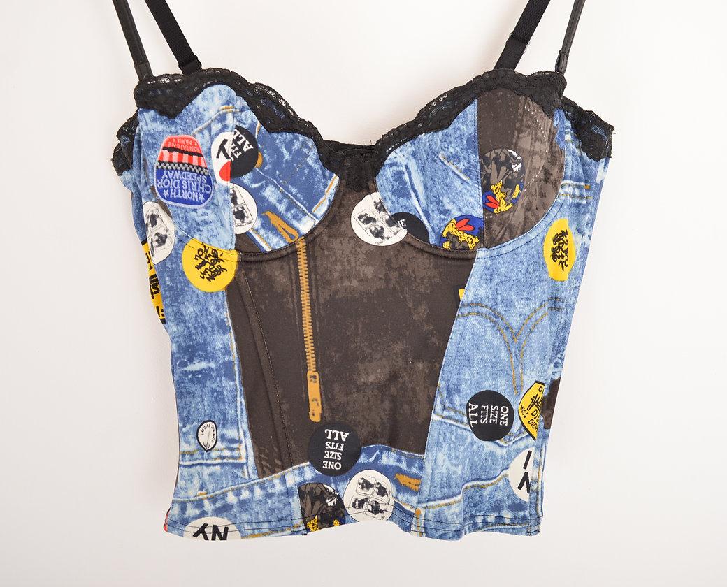 Iconic Christian Dior 'Miss Diorella' bustier corset in a Denim Trompe-l'oeuil Print , from the highly coveted Fall / Winter 2001 collection by John Galliano.
 
Features;
Fully adjustable / detacheable shoulder straps
Boned body
Iconic Galliano