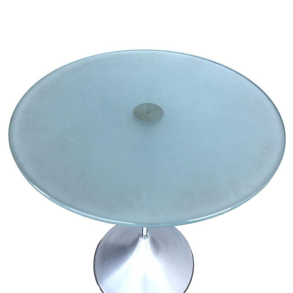 Y2K era side table featuring a floating frosted green glass top resting on a brushed aluminum base. The table echoes the sleek elegance of Charles Hollis Jones’ iconic “Bugle” design with a late 20th-century twist.

Unsigned

5