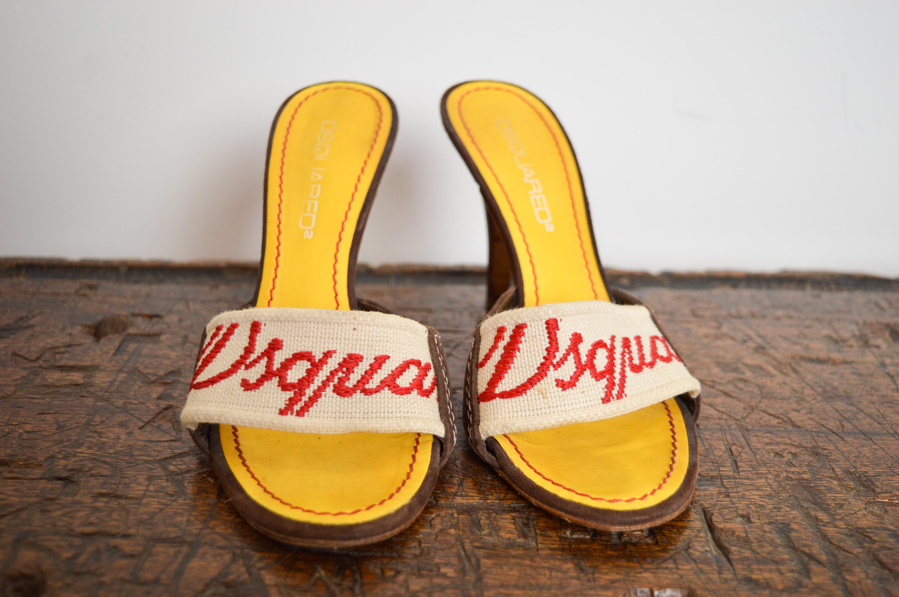Fabulous 2000's DsQuared2 kitten heels, featuring canvas 'spell out' foot straps in cream and red woven cotton with brown suede panels featuring a contrast white stitch and leather soles !
MADE IN ITALY.
U.K. Size 4 / EU Size 37
Heel height : 3.5”