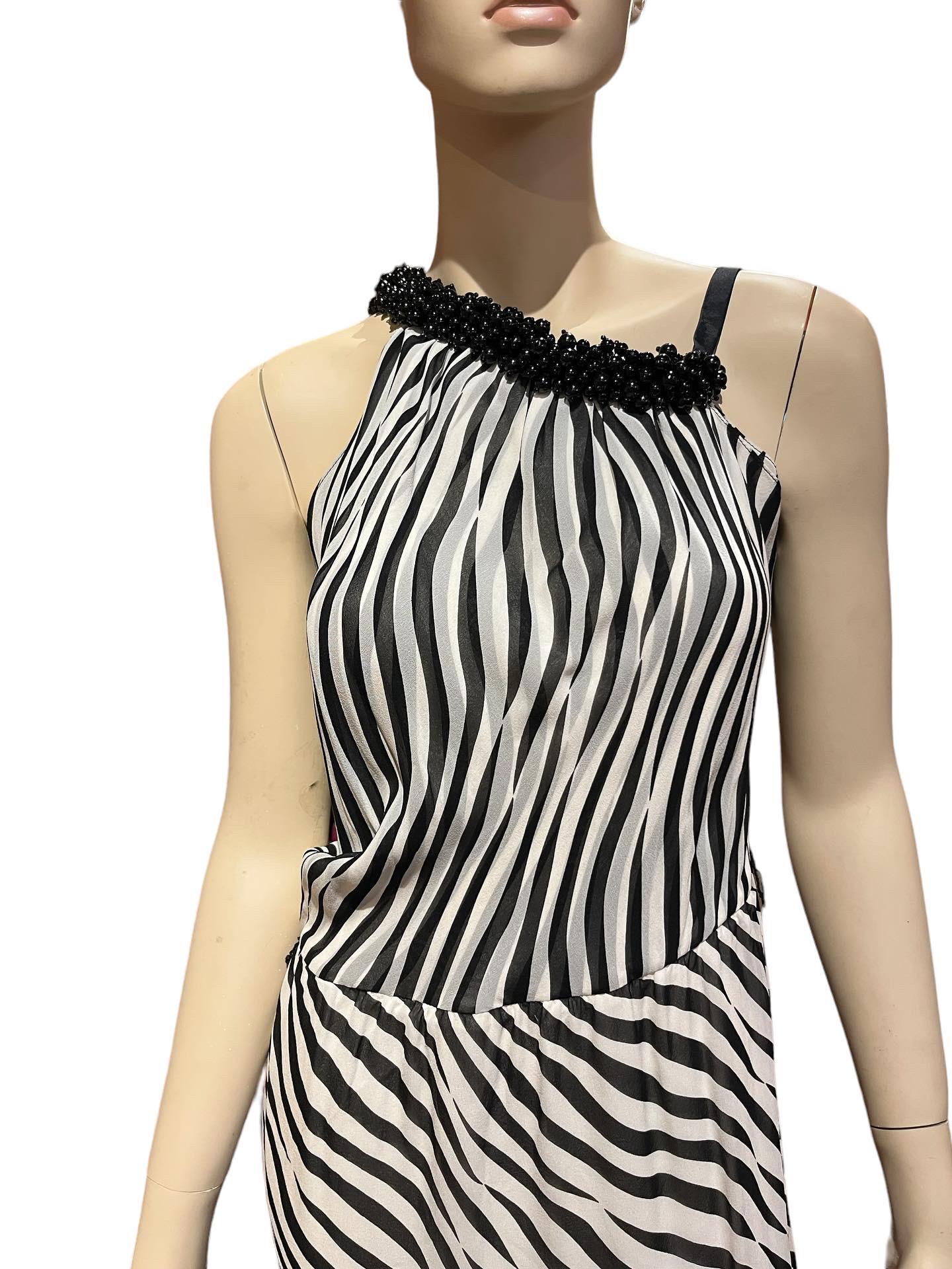Y2k Stephen Burrows Zebra Stripe Silk Chiffon Gown with Beaded Asymmetrical Neckline

Labeled size 8 
34”bust 
64”length

Stephen Burrows is an American fashion designer based in New York City, known for being one of the first African-American