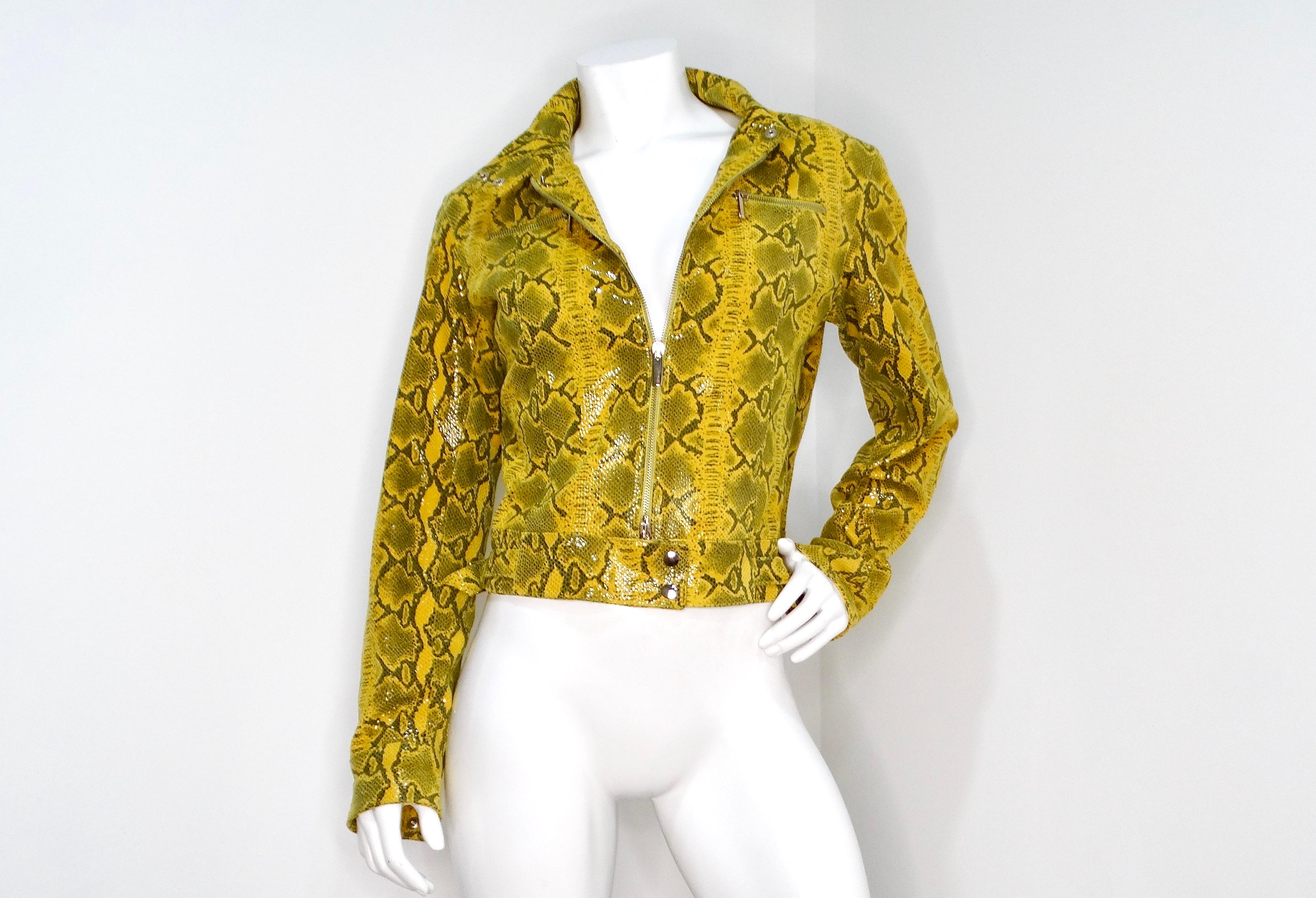 Introducing the captivating Y2K Yellow Python-Print Suede Biker Style Jacket, a striking statement piece that dazzles with its faux yellow python print. The luxurious suede fabric shimmers beautifully when it catches the light, adding a touch of
