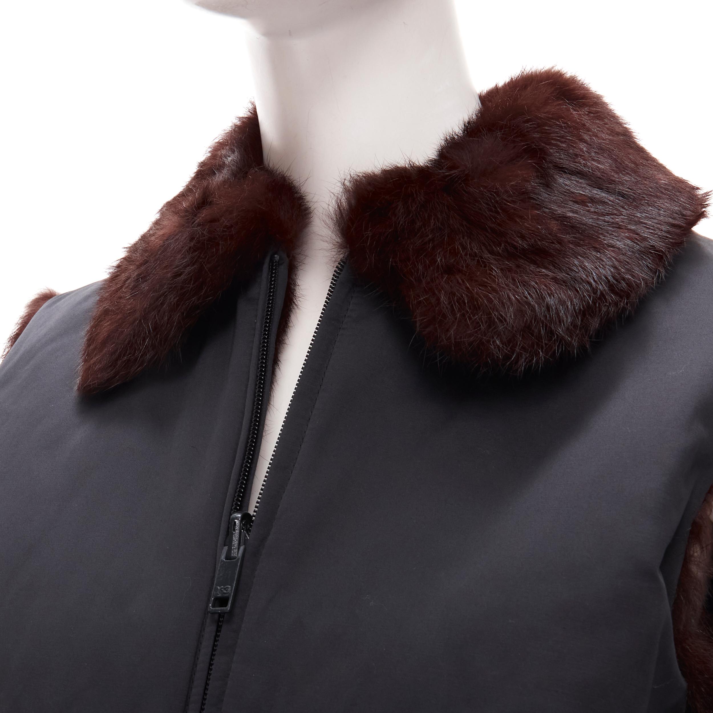 Y3 YOHJI YAMAMOTO ADIDAS black nylon brown genuine fur reversible vest jacket S 
Reference: ANWU/A00687 
Brand: Y3 
Designer: Yohji Yamamoto 
Material: Nylon 
Color: Black 
Pattern: Solid 
Closure: Zip 
Extra Detail: Genuine fur lining. Reversible
