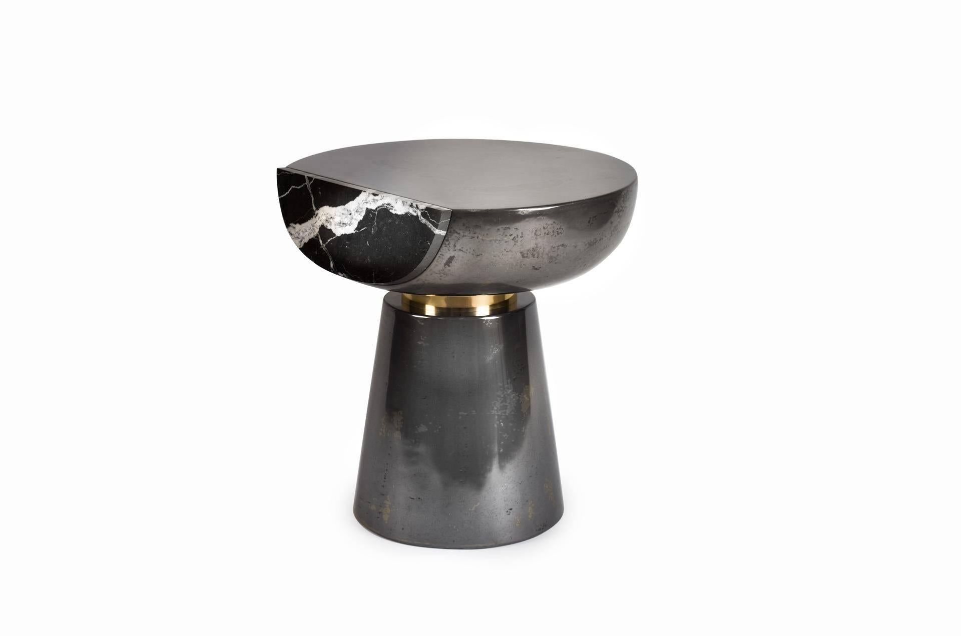 Handcrafted in the designer's workshop studio, the Ya Yo table is a perfect blend of cocktail table and collectible art design piece.
