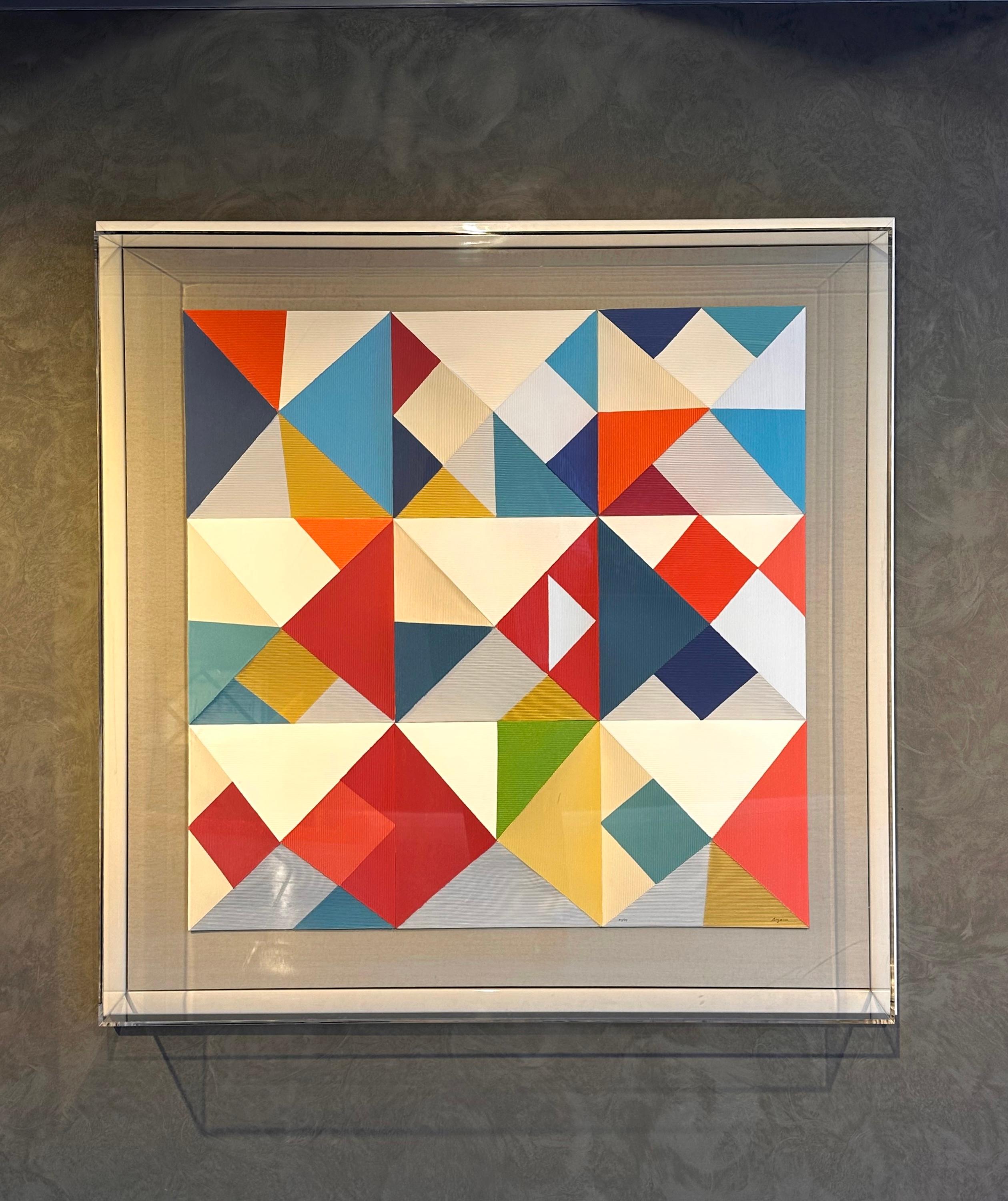 Yaacov Agam, born in 1928, is a pioneering figure in the kinetic art movement and one of its most distinguished contemporary representatives. His works break away from static representations of reality, presenting it instead as a process of
