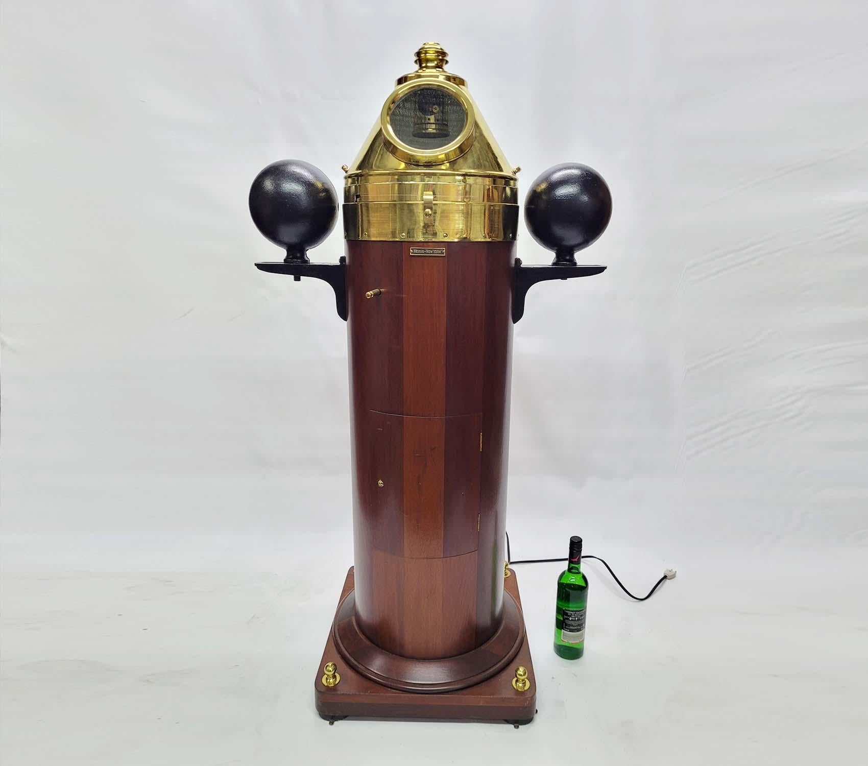 Magnificent Yacht Binnacle by American Ships chandler Negus of New York. Meticulously polished and lacquered brasses on this nautical relic. The gimballed compass is engraved with makers name E.S. Ritchie and Sons Inc., Boston mass and serial number