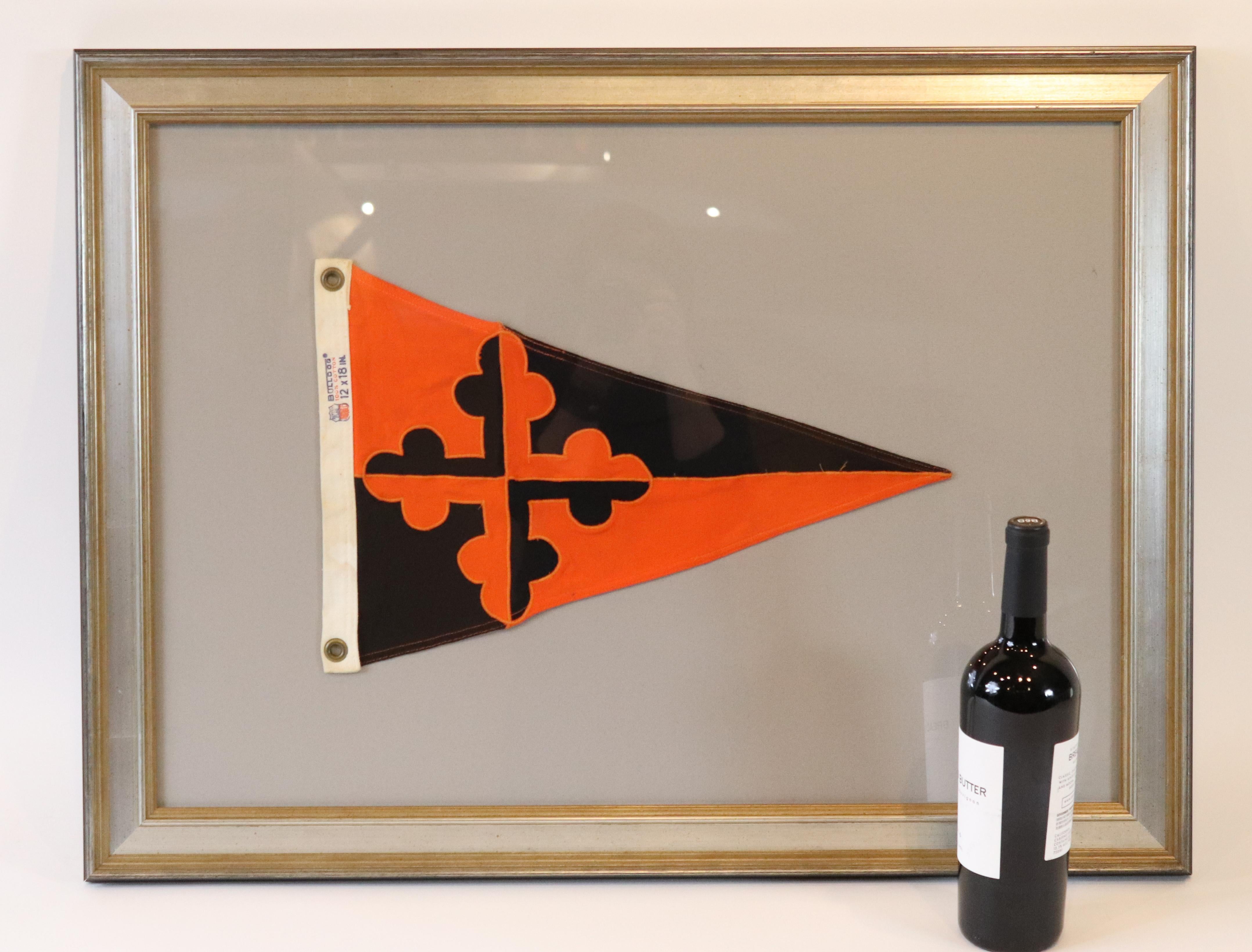 Nautical yacht club flag. Showing a burgee from the Baltimore yacht club. Distinctive orange and black design. Cotton with wool bunting by 