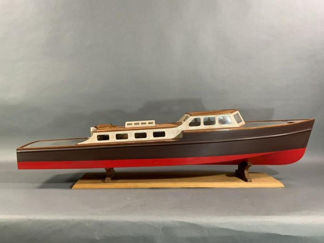 Plank on frame yacht model with long cabin. Built to a Basset Lowke plan. Removeable cabin. No engine. Weight is 10 lbs 12
