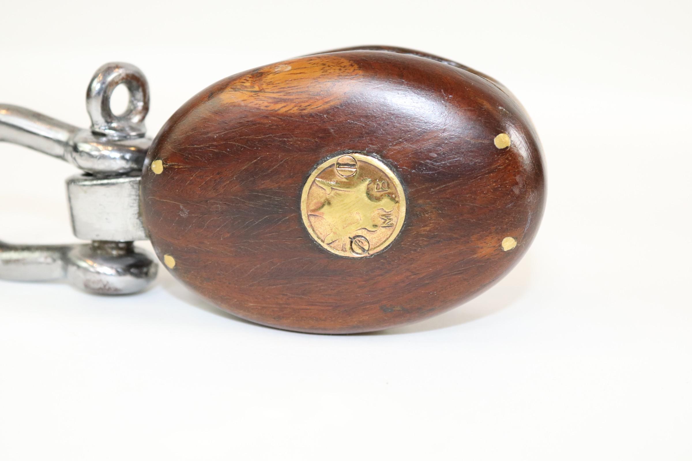 Single sheave yacht pulley by Merriman. With polished and lacquered steel fittings and polished brass pulley wheel. Awesome restoration. Weight is 2 pounds. X-128