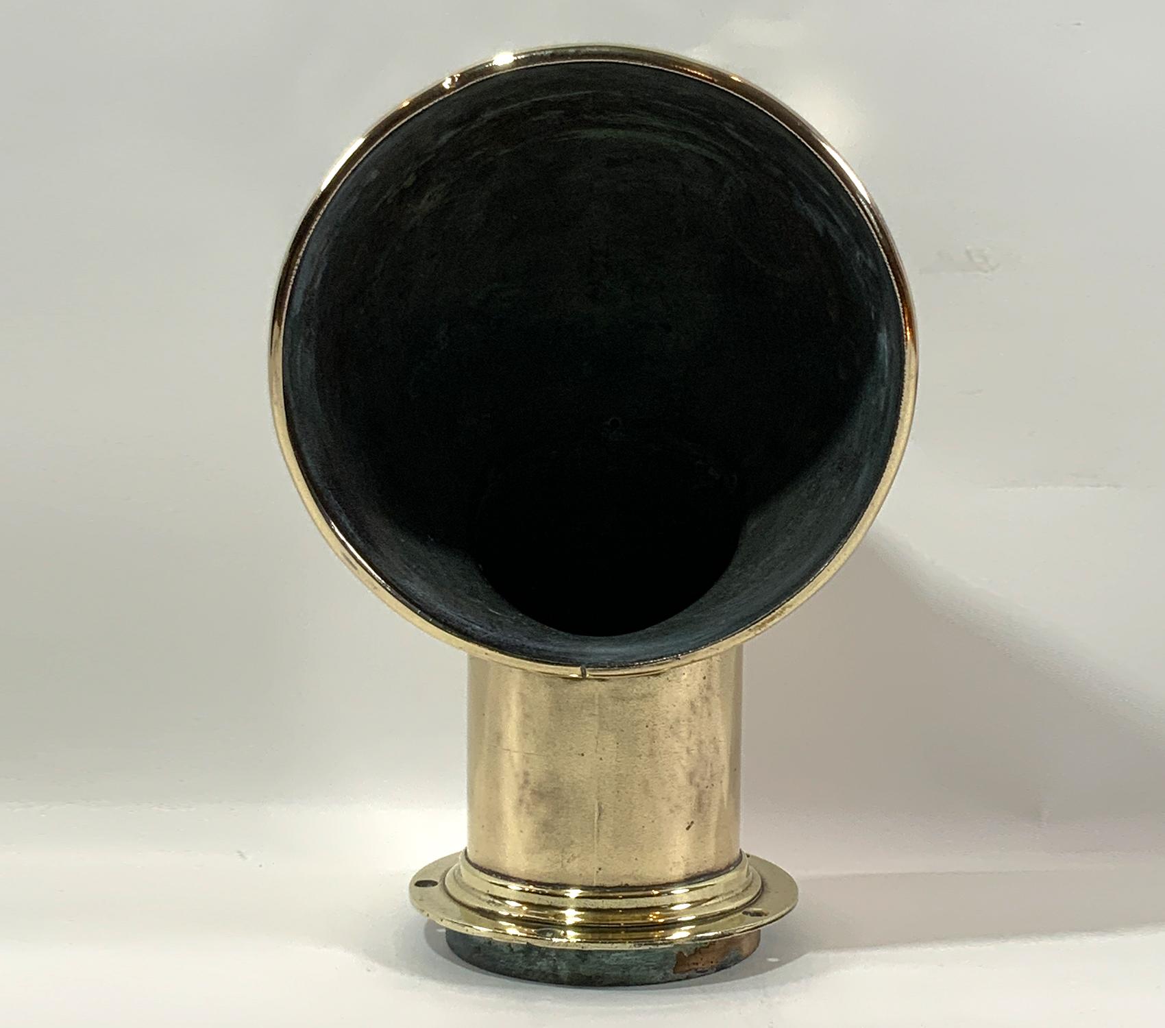 Solid brass Perko air vent. Highly polished ventilator cowl from a boat. Nine inch diameter vent opening. Base is six inch diameter. Twelve inches tall with base flange pierced for four bolts. Circa 1940.