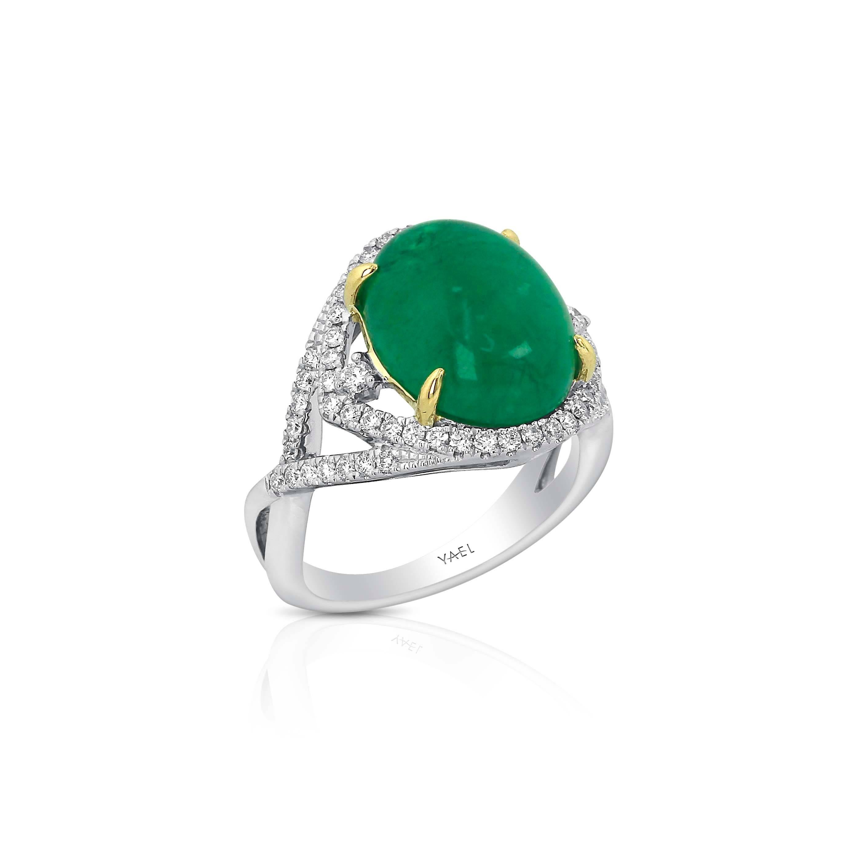Yael Designs created a ring featuring a 7.19 carat oval cabochon emerald accented with approximately 0.50 carats of brilliant white round diamonds set in two toned (white and yellow) gold. 
