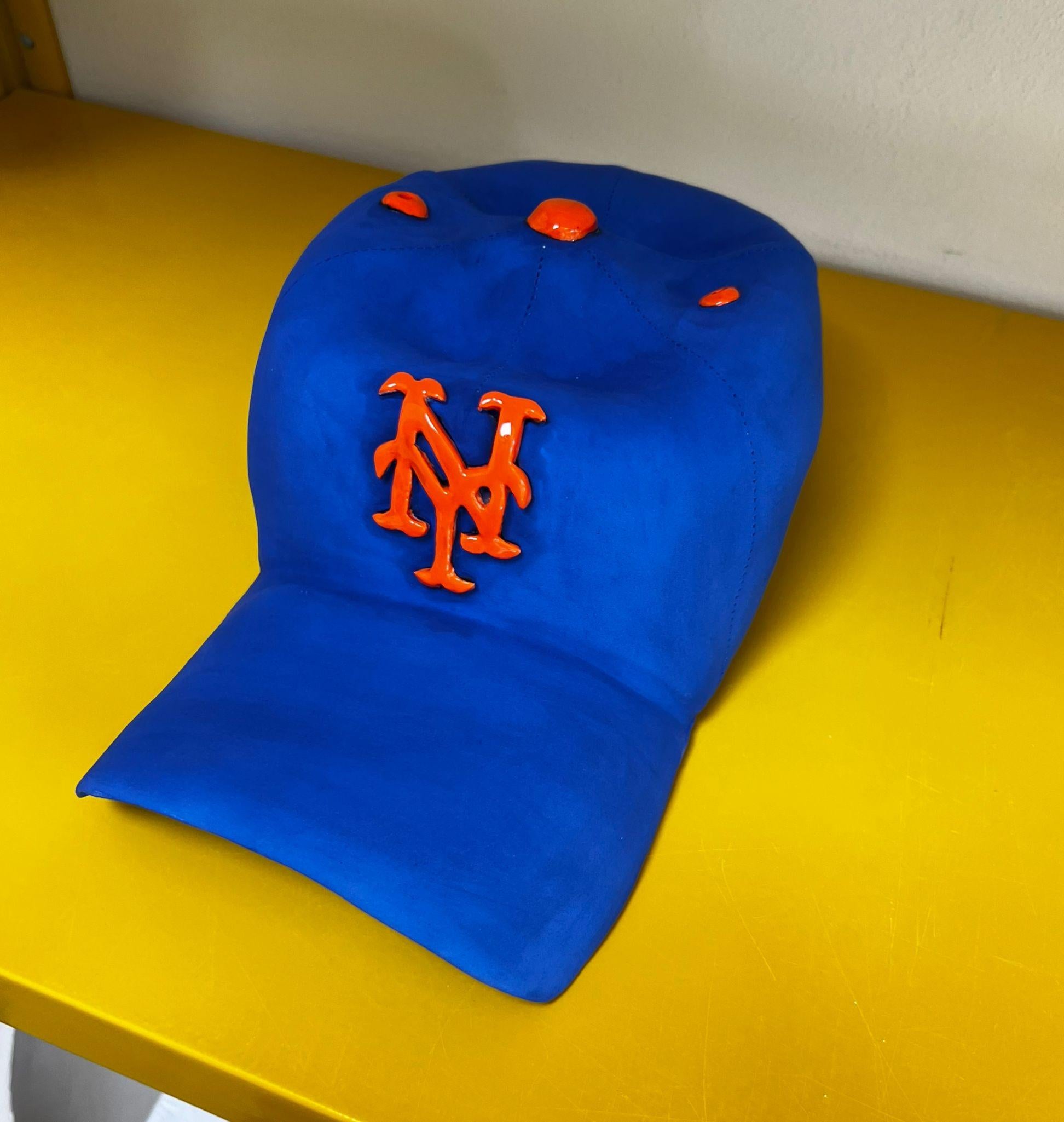 Ceramic NY Mets cap sculpture - figurative sculpture, pop sculpture - Sculpture by Yael Yanay