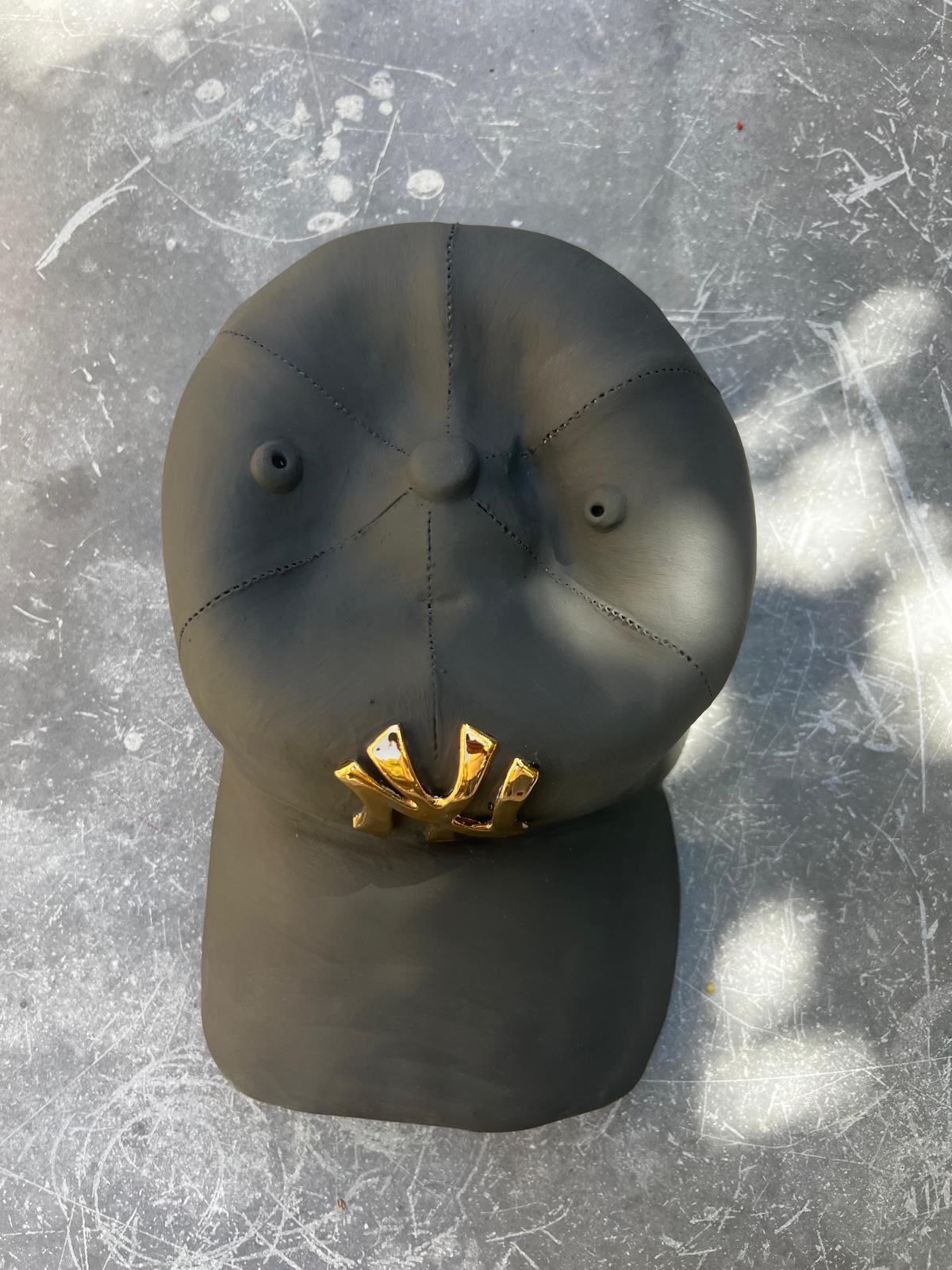 Ceramic NY Yankees cap sculpture (golden) - figurative sculpture, pop sculpture - Gray Figurative Sculpture by Yael Yanay