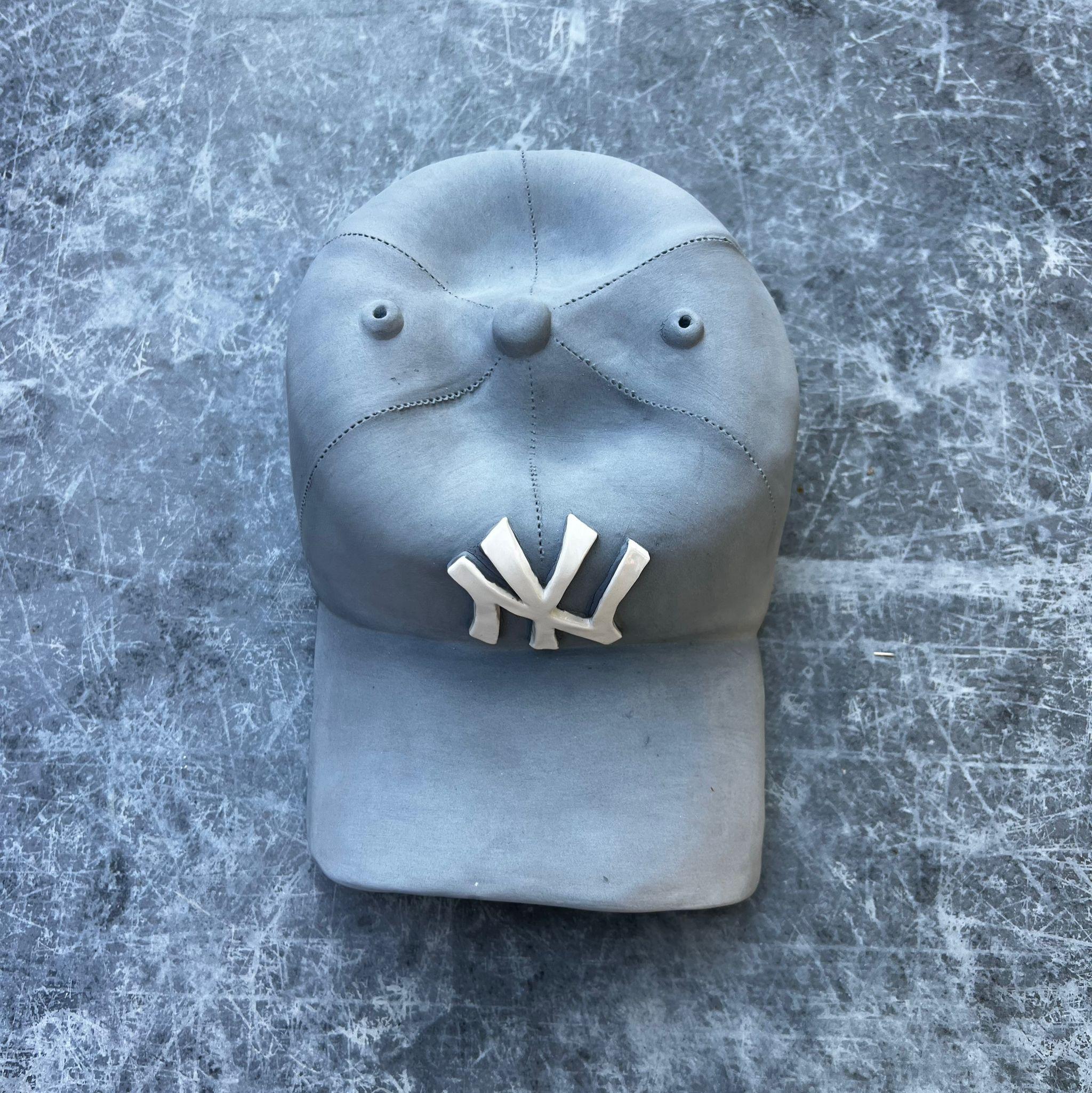 Ceramic NY Yankees cap sculpture (grey) - figurative sculpture - Pop Art Sculpture by Yael Yanay