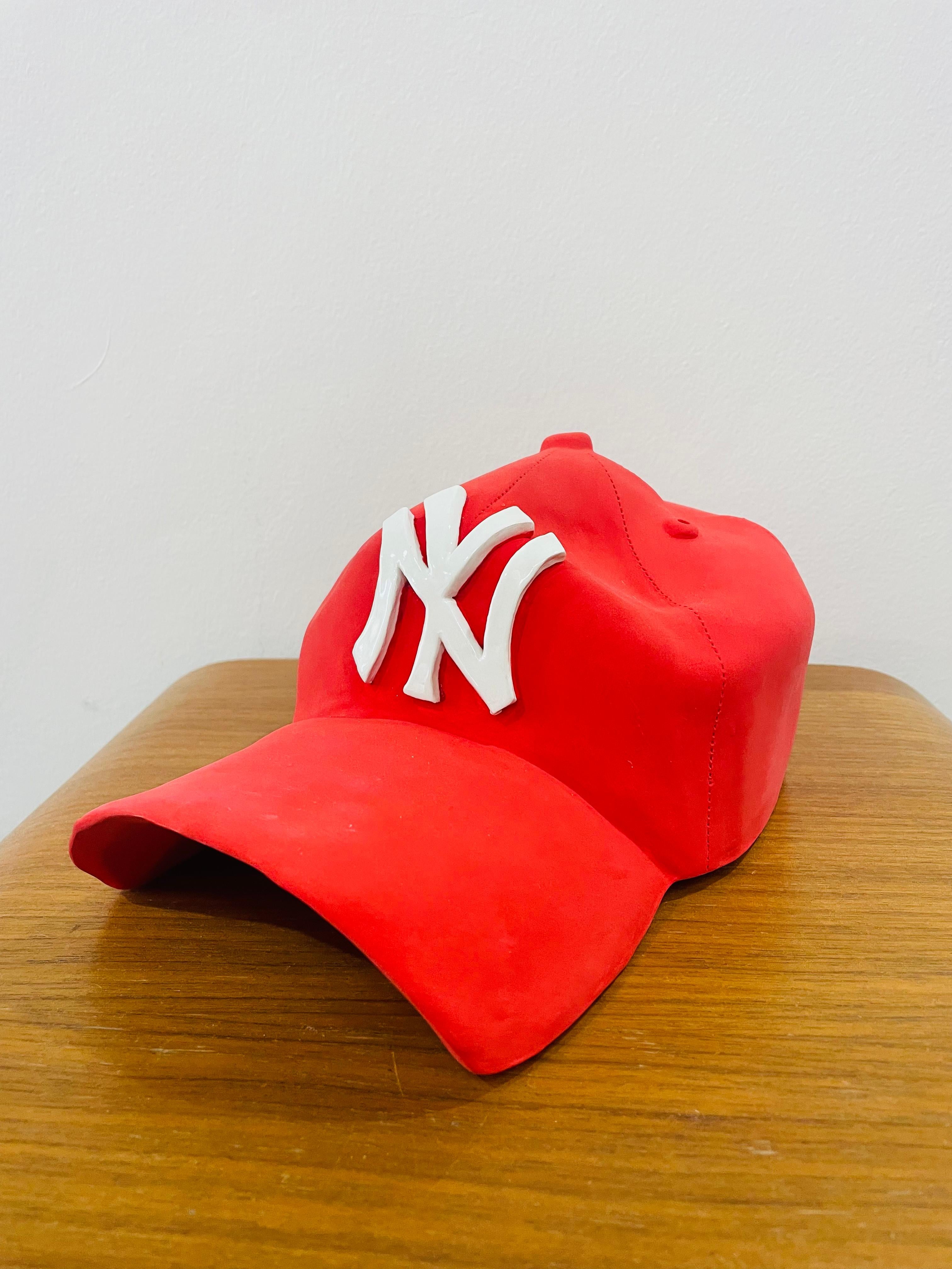 NY Yankees ceramic cap sculpture (red) - figurative sculpture - Sculpture by Yael Yanay