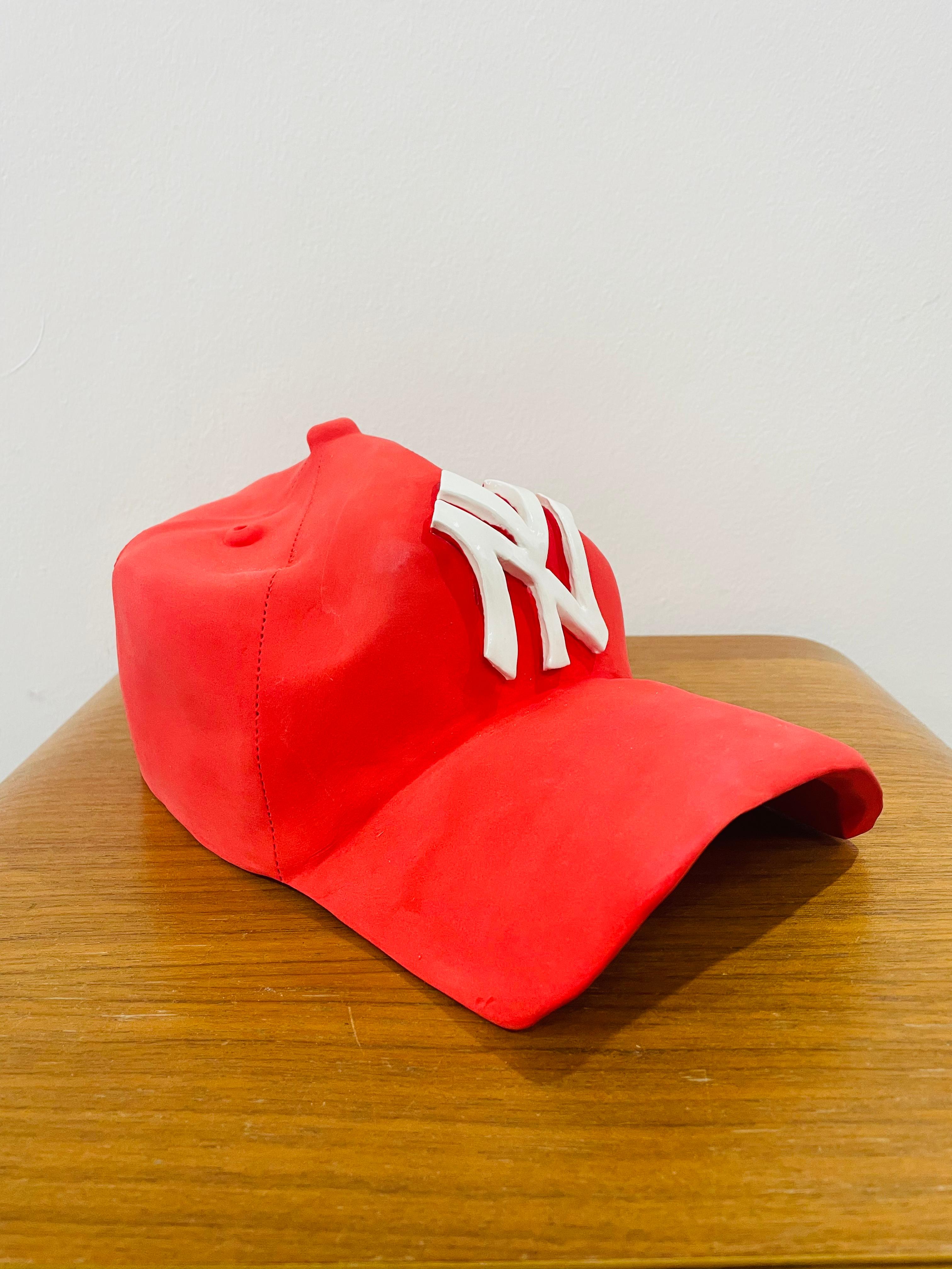 NY Yankees ceramic cap sculpture (red) - figurative sculpture - Pop Art Sculpture by Yael Yanay
