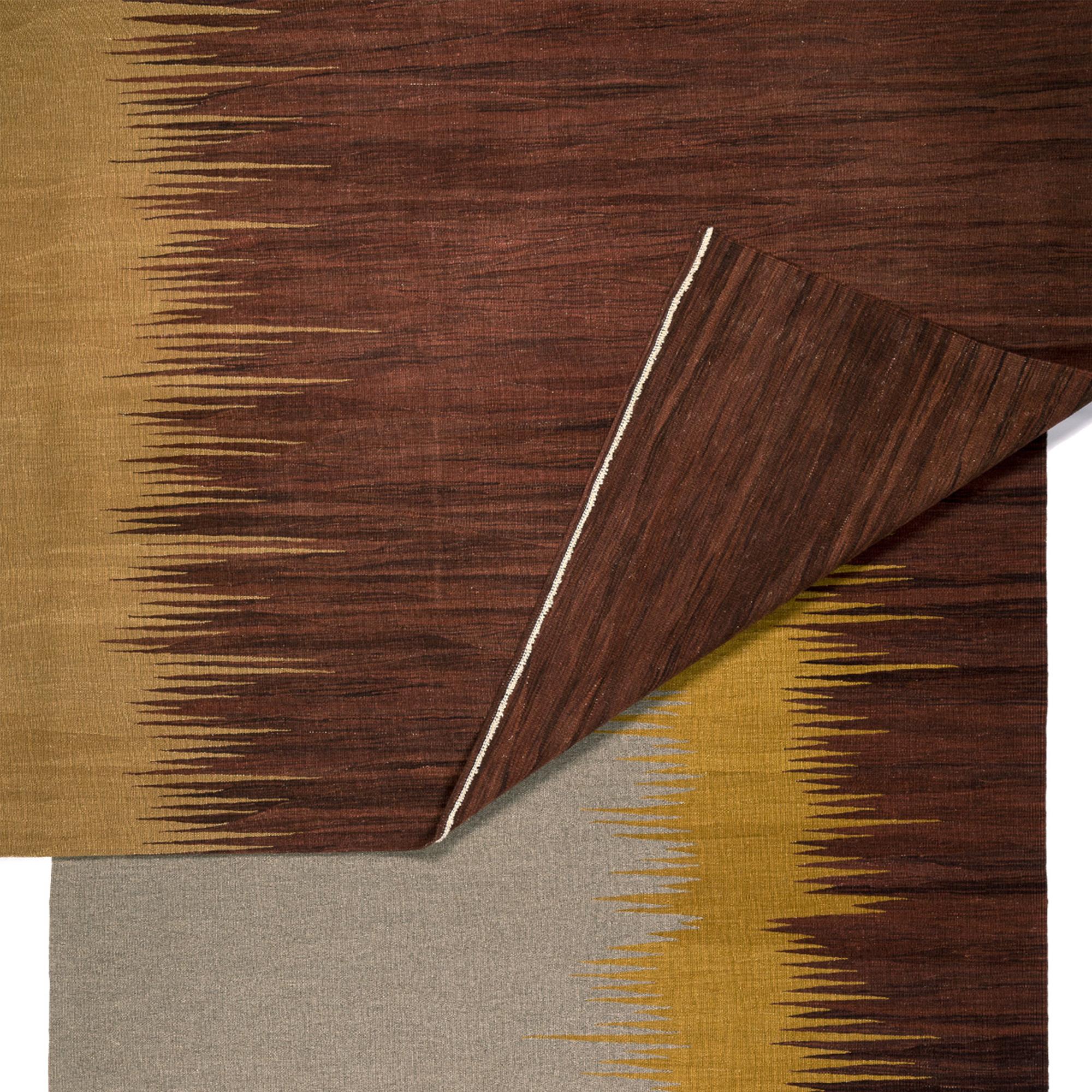 Yakamoz No 1 kilim rug is part of a series of kilims that take their inspiration from the poetry of light reflections on the sea surface. The abstract patterns, which are reminiscent of alternating color transitions created by reflected light, are