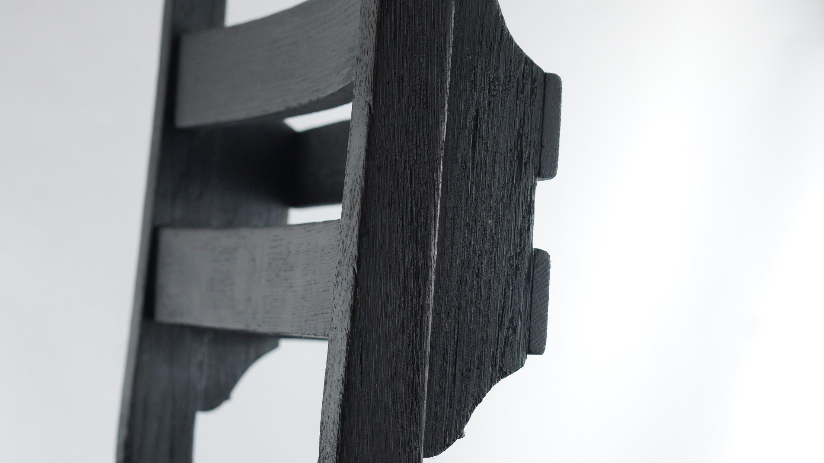 Seven Cedars Co. has re-contextualized vintage 1940s oak chapel chairs with back pockets in a limited edition run of 50.  These elegant chairs have been modernized and treated in the Japanese fire-charring technique of Yakisugi or Shou-sugi-ban,