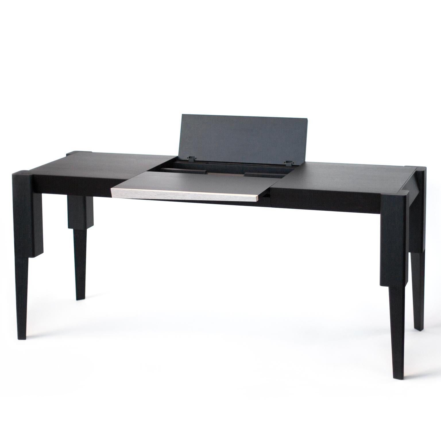The writing desk YAMA is made in black oak wood. 
The Table  invites to communicate. It expresses a feeling of clearance and safety. Not for nothing is this furniture a combination of creativity and productivity, which is shown throughout its