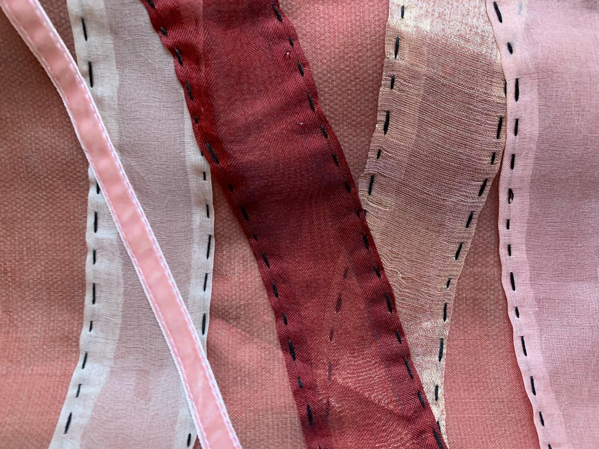 Hand-stitched silk organza ribbon cozies up with velvet, kindling geometric divinity.

Down Feathers insert, Zip Closure.

--
The Maki Yamamoto Textile Studio is a modern atelier specializing in bespoke textiles. Rooted in the world of ancient