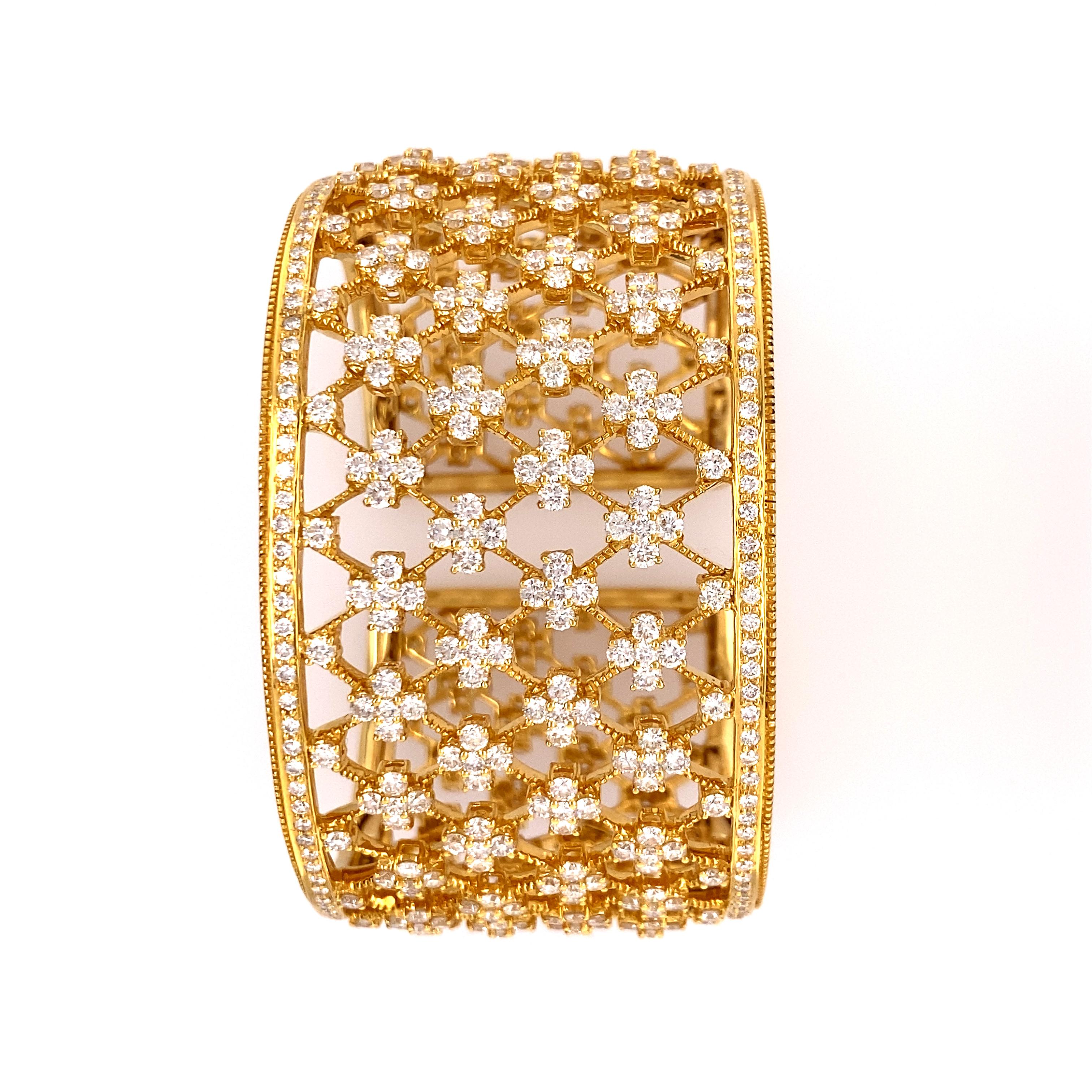 18k Yellow gold frame, signed by Yanes.
Important Bracelet with Fine Round Brilliant Diamonds, approximately 25-30 cts.   
Diamond color D E F  and clarity VVS1- VS1.
Total weight 74.3 dwts,  Bracelet wrist is 8.13 inches and 1.82 inches wide. 