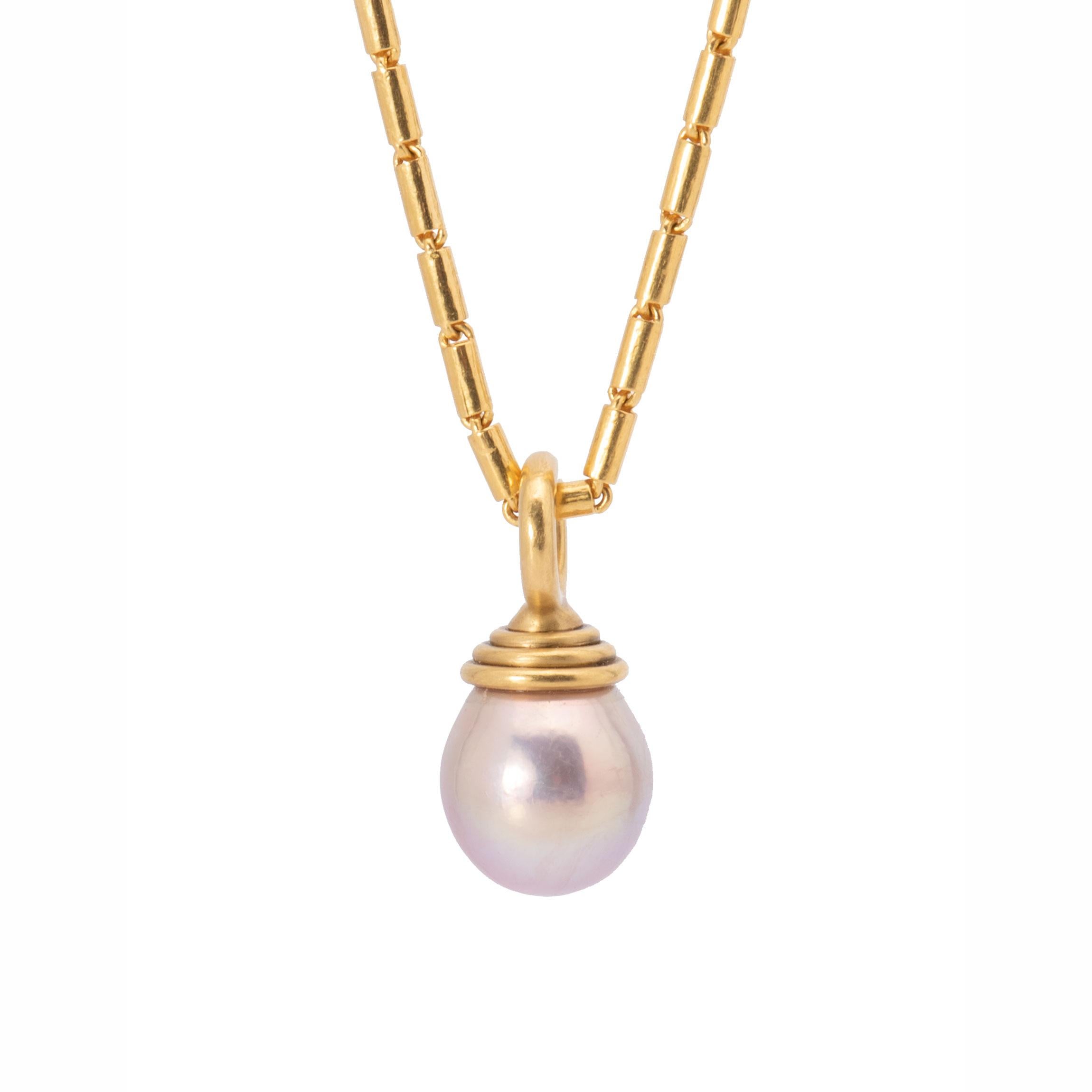 The Yangtze River in China produces spectacular pearls, often a pink, mauve with a lovely metallic nacre like this one. We've capped our Yangtze River Pearl Pendant in 22k gold with a generous bail to accommodate a heavier chain like the 24k Baht