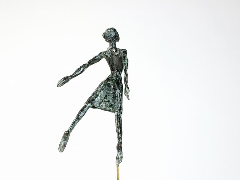 Danseuse Envolée, bronze sculpture by French contemporary artist Yann Guillon. 25 cm × 10 cm × 5 cm.
This artwork is signed and numbered, and sold with a metal base. Limited edition of 8 + 4 artist's proofs. 
Yann Guillon focuses his work on the