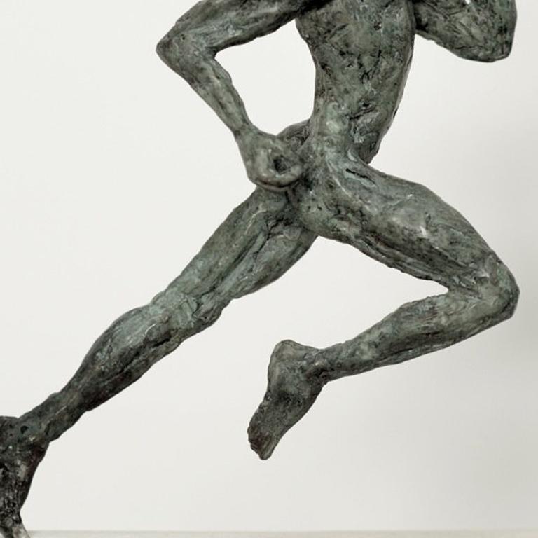 Sprinter is a small-scale bronze sculpture of a nude running athlete by Yann Guillon. This French contemporary artist focuses his work on the human body, using an expressionist approach to convey alternately strength or sensuality.  Available in