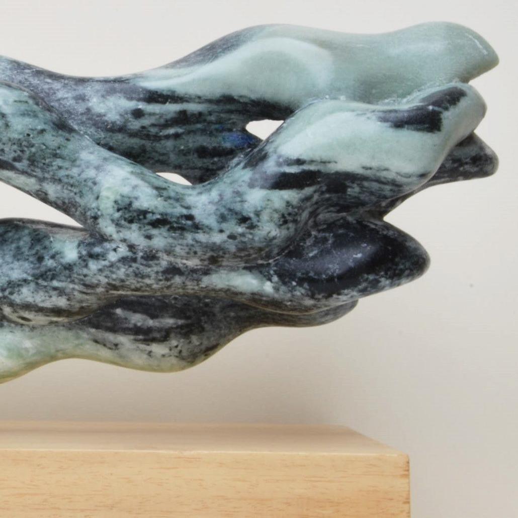 Wave II, one-off sculpture by French contemporary artist Yann Guillon.  
Soapstone sculpture with wood base,  17 cm × 49 cm × 15 cm.
By combining his intimate knowledge of the material and a deep understanding of the form, the sculptor managed to