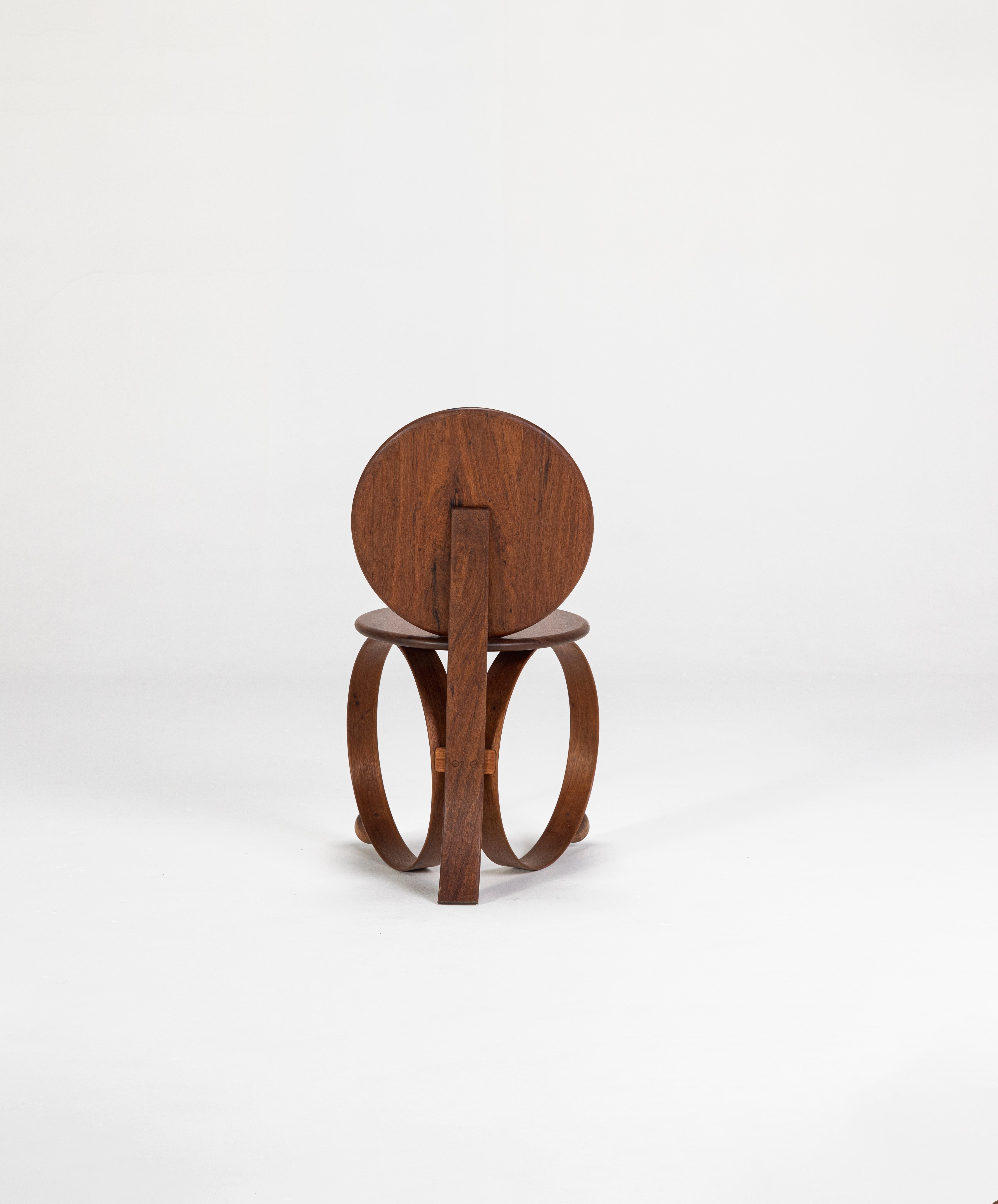 Dedicated to Yara, the chair began with the experimenting with different ways of working the solid wood in the studio. The circular legs and the back leg were made of solid steambent wood. In this technique, the pieces are submerged in water for two