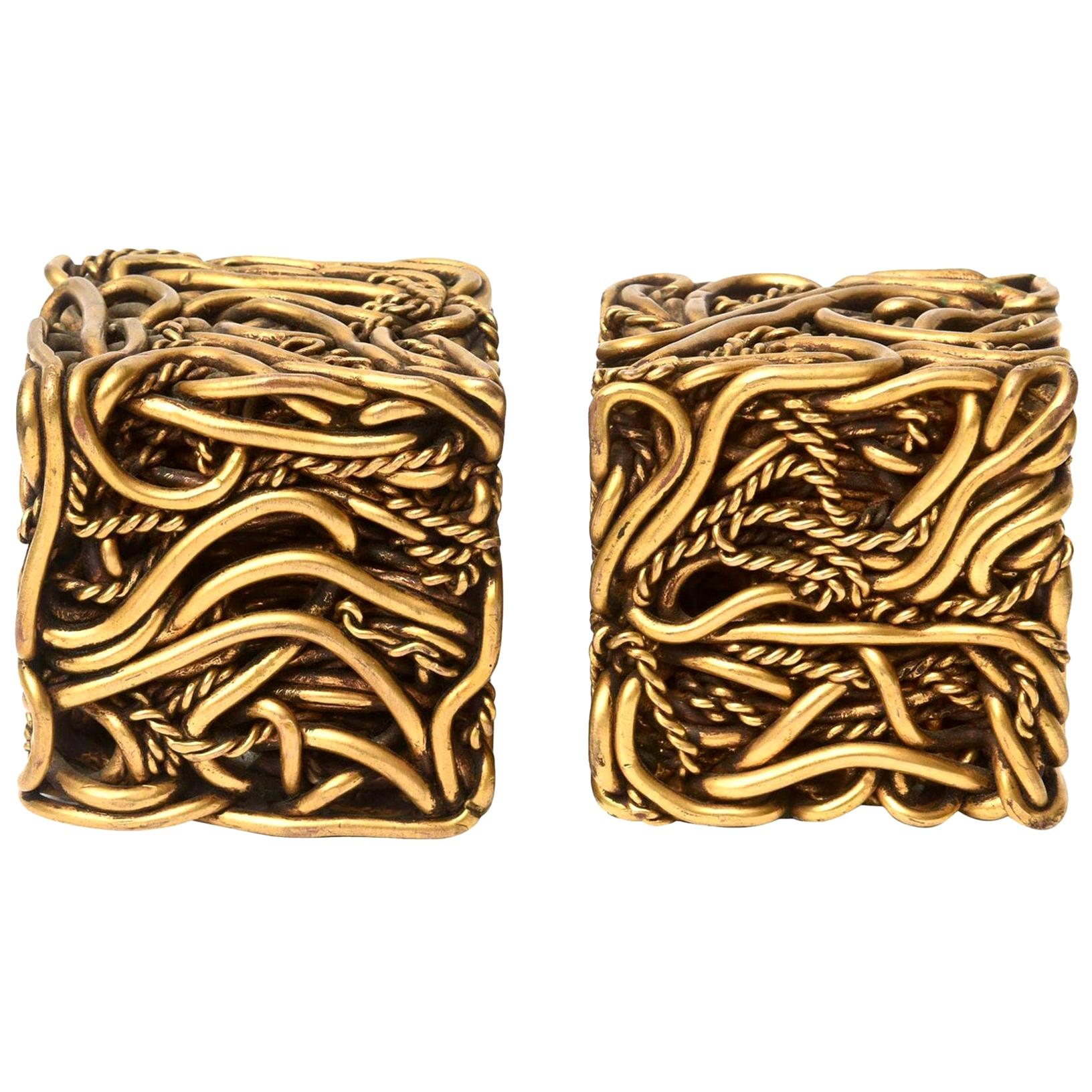 These amazing and fabulous pair of signed French bronze square cube sculptures are meticulously intertwined works of bronze braided and twisted rope giving a spaghetti like design. They were purchased in France and signed on one of them Yascal. They