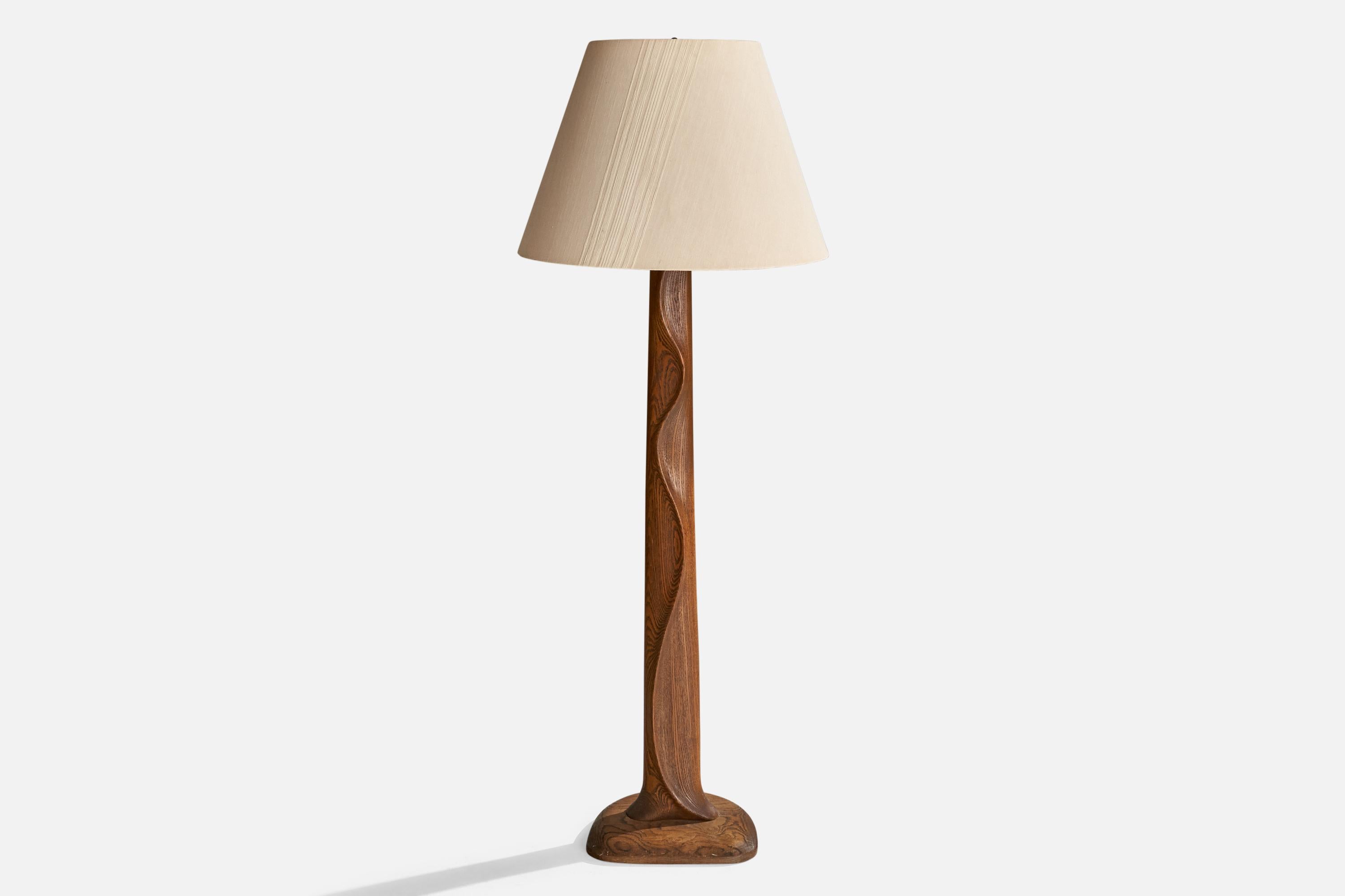An oak and fabric floor lamp attributed to Yasha Heifetz, USA, c. 1950s.

Vintage lampshade in fair condition.

Dimensions of Lamp with Shade (inches): 64.5” H x 25” Diameter
Bulb Specifications: E-26 Bulbs
Number of Sockets (per fixture): 1

Sold
