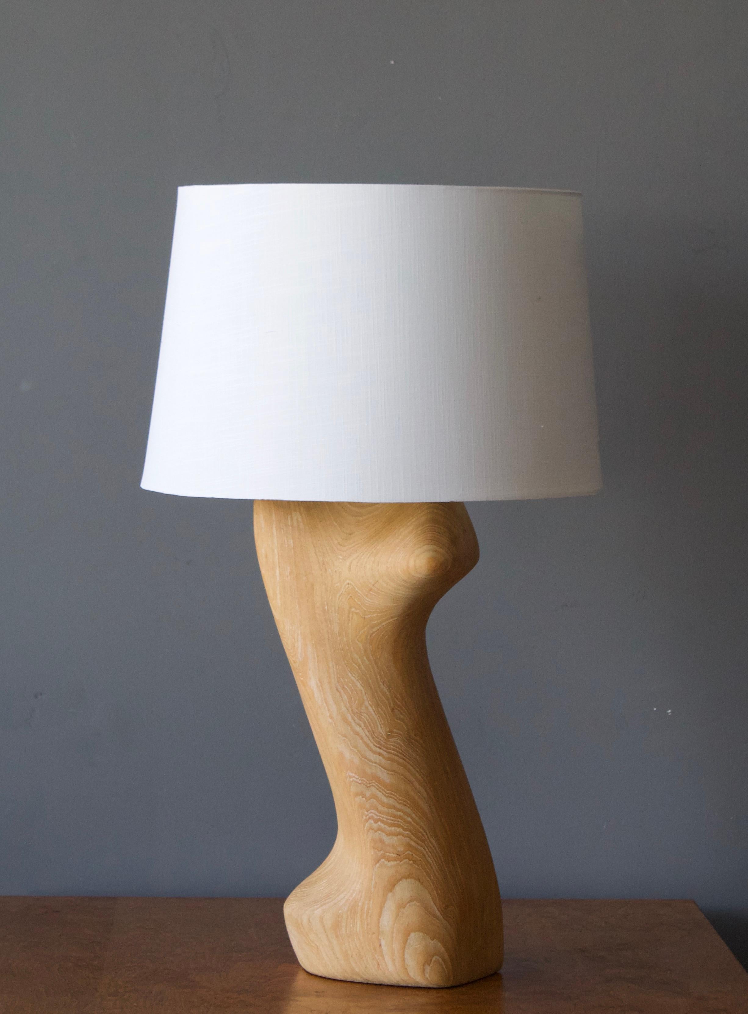 A sizable sculptural table lamp. Design attributed to Yasha Heifetz. 

Sold without lampshade. Stated dimensions excluding diffuser and lampshade, height includes brass socket.

Other designers of the period include Isamu Noguchi, George