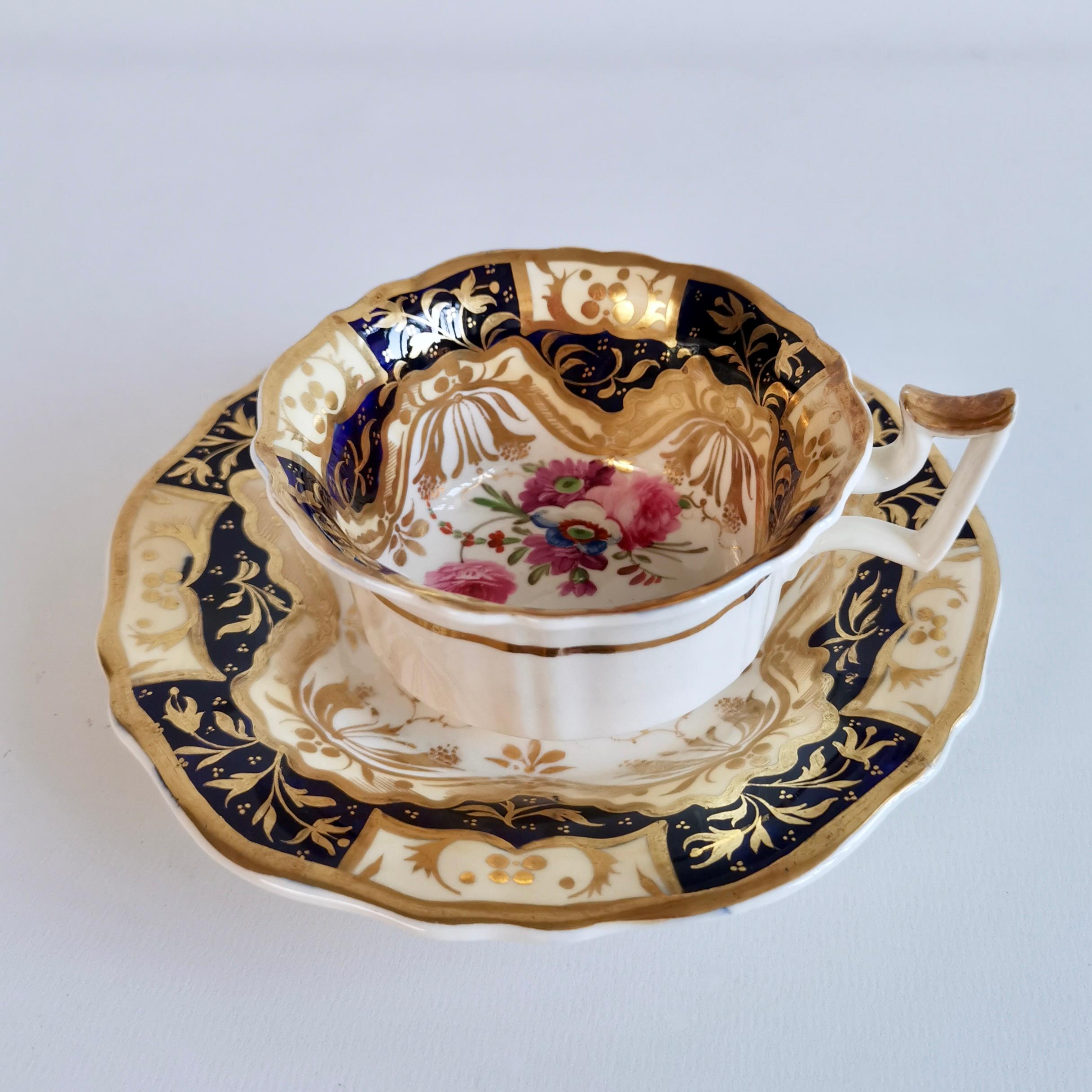 This is beautiful true trio consisting of a teacup, a coffee cup and a saucer, made by Yates in about 1825, which is known as the Regency period. The set was decorated with the famous pattern 1165, which was a pattern done by a factory often called