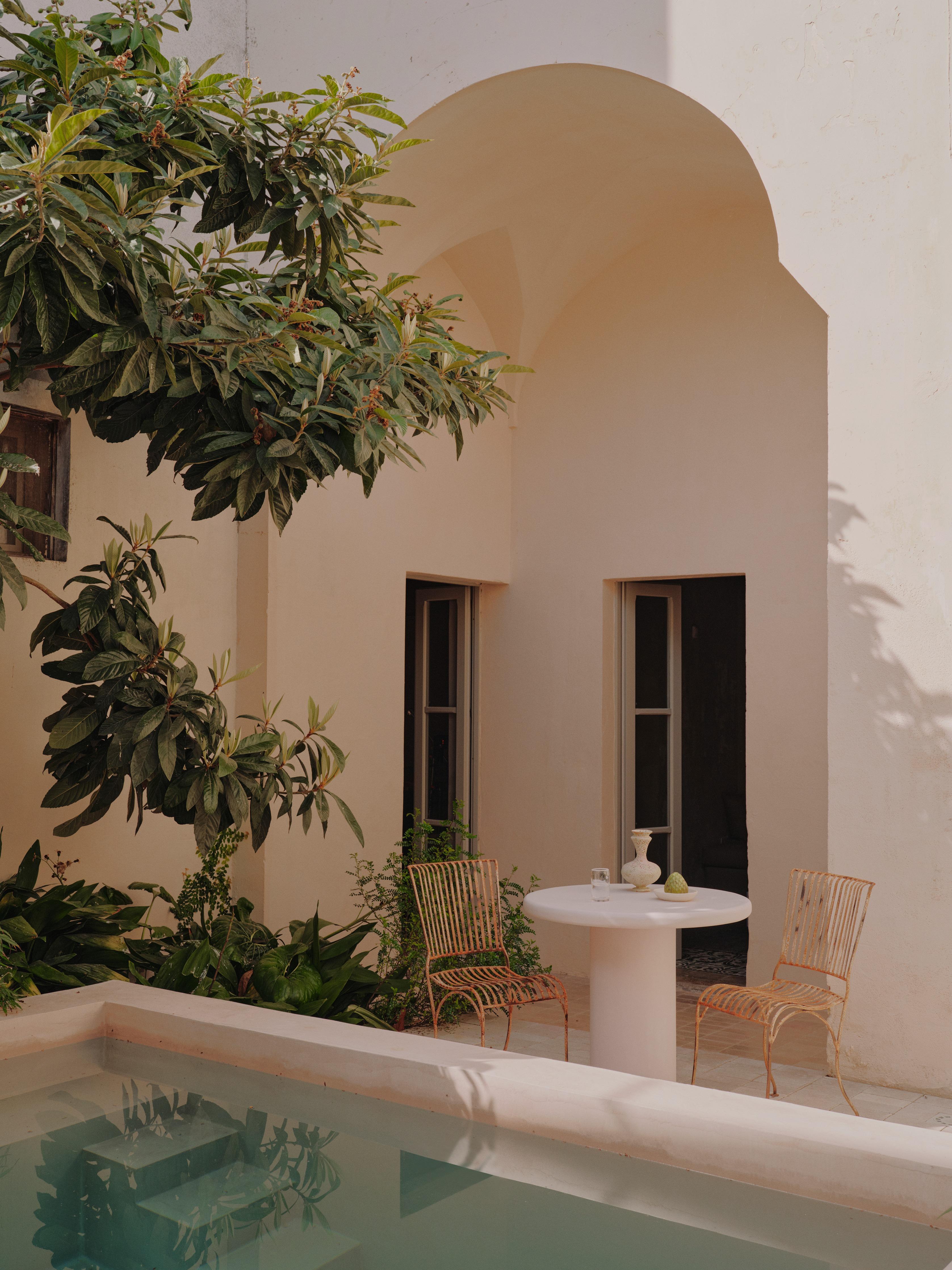 Handcrafted in Spain by expert artisans, this oval-shaped dining table from Marlot Baus combines timeless design with modern craftsmanship. Each piece is carefully made using our signature microcement technique, layered by hand to achieve a smooth,