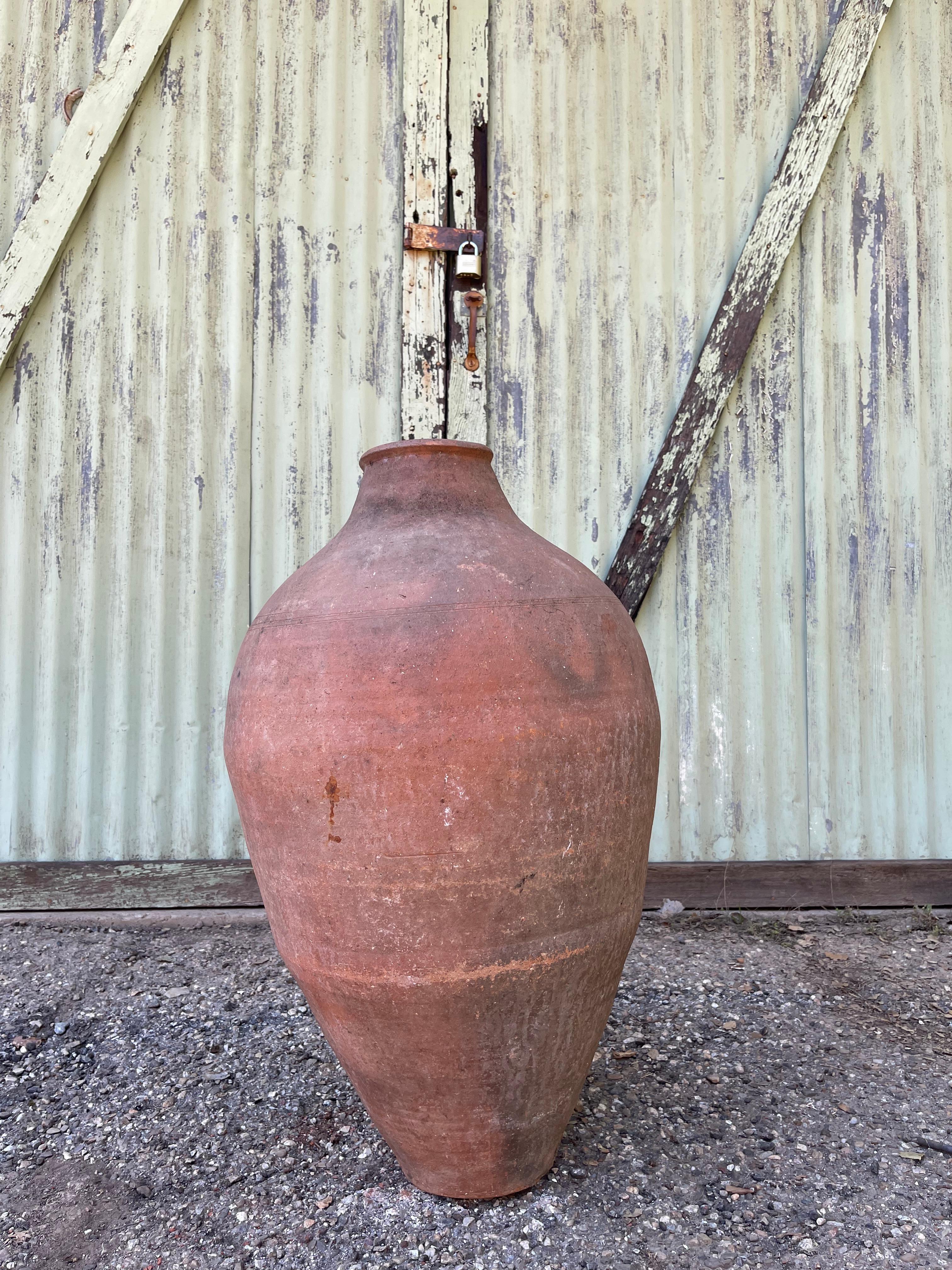 This medium-sized Turkish jug was used to store yogurt, butter, cheese, or Ayran: a hydrating yogurt drink frequently enjoyed alongside Turkish meals. “Yayık” pottery is specifically designed to churn, store, and preserve dairy products. The round