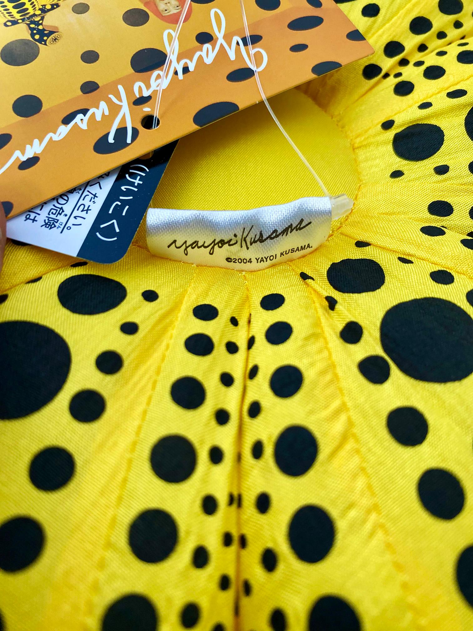 Yayoi Kusama Yellow & Black Pumpkin (plush):
An iconic, vibrantly colored pop art piece - this soft Kusama pumpkin features the universal polka dot patterns and bold colors for which the artist is perhaps best known. Kusama first used the pumpkin at