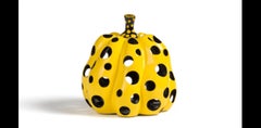 Pumpkin sculpture with holes By Yayoi Kusama