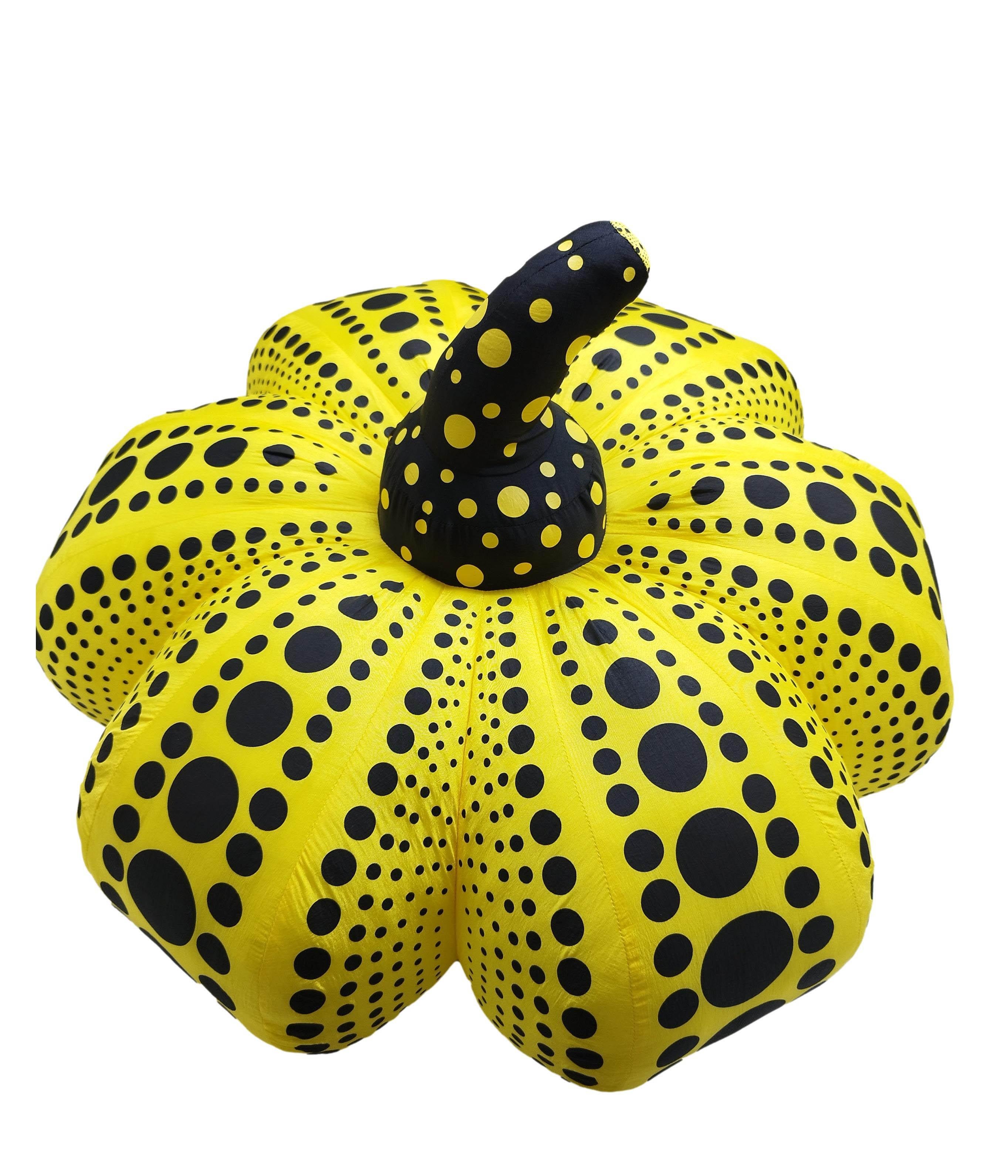 An iconic piece of brightly coloured pop art, this large plush pumpkin by Kusama features the universal polka dot motifs and bright colours for which the artist is perhaps best known. The pumpkin was first used at the 1993 Venice Biennale for the