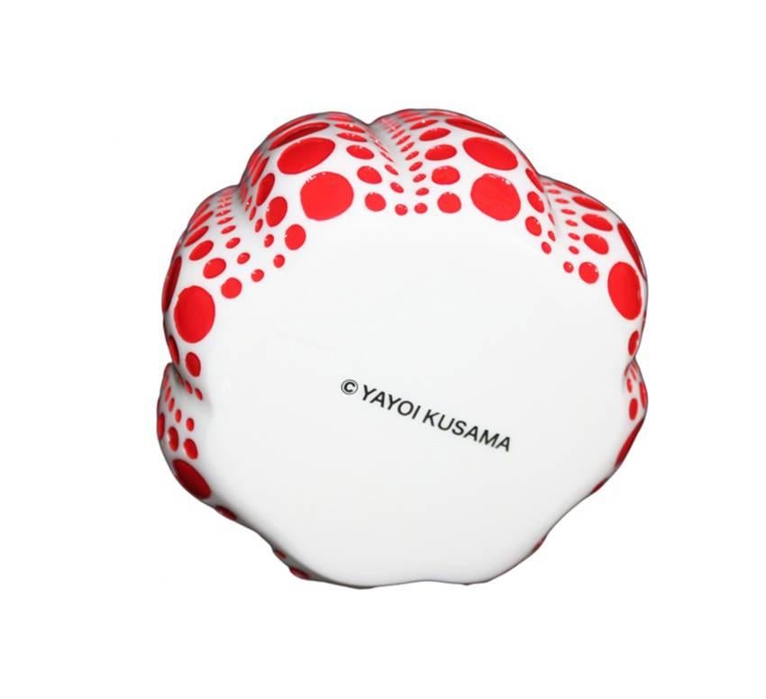 Yayoi Kusama Pumpkin: Red and White:
An iconic, vibrantly colored pop art piece - this small Kusama pumpkin sculpture features the universal polka dot patterns and bold colors for which the artist is perhaps best known. Kusama first used the pumpkin