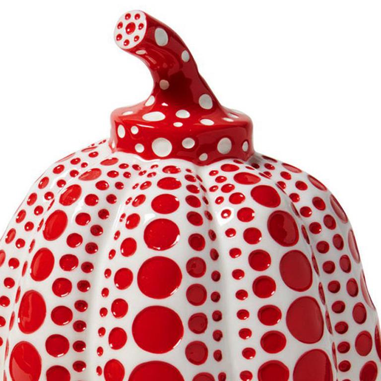 Yayoi Kusama Pumpkin: Red and White:
An iconic, vibrantly colored pop art piece - this small Kusama pumpkin sculpture features the universal polka dot patterns and bold colors for which the artist is perhaps best known. Kusama first used the pumpkin