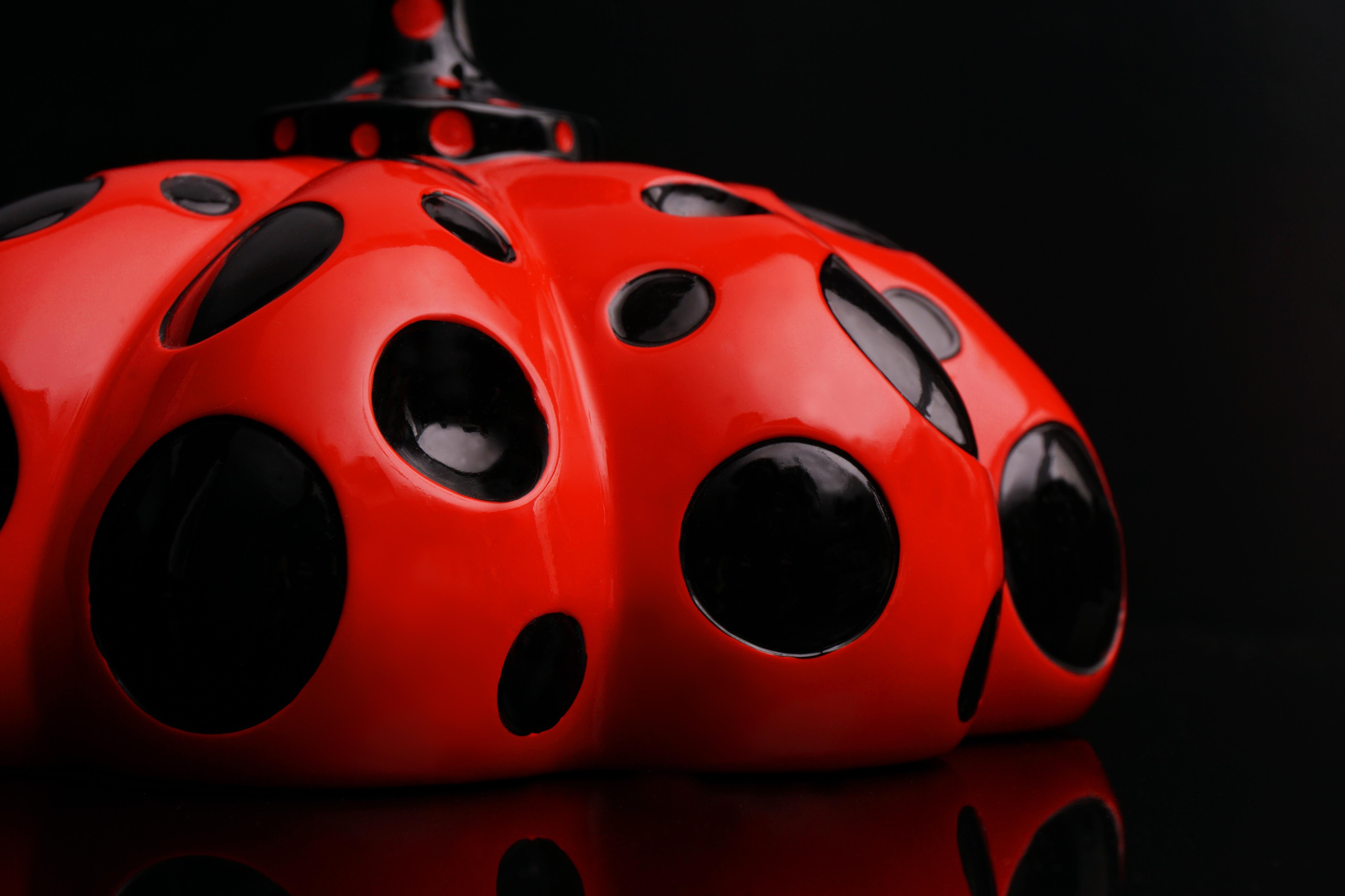 The ’Naoshima’ Red Pumpkin is a painted lacquer resin abstract sculpture and art object by legendary contemporary Artist, Yayoi Kusama. Created in 2019, the polka-dotted piece is a quintessential example of Kusama’s iconic motif, as the pumpkin