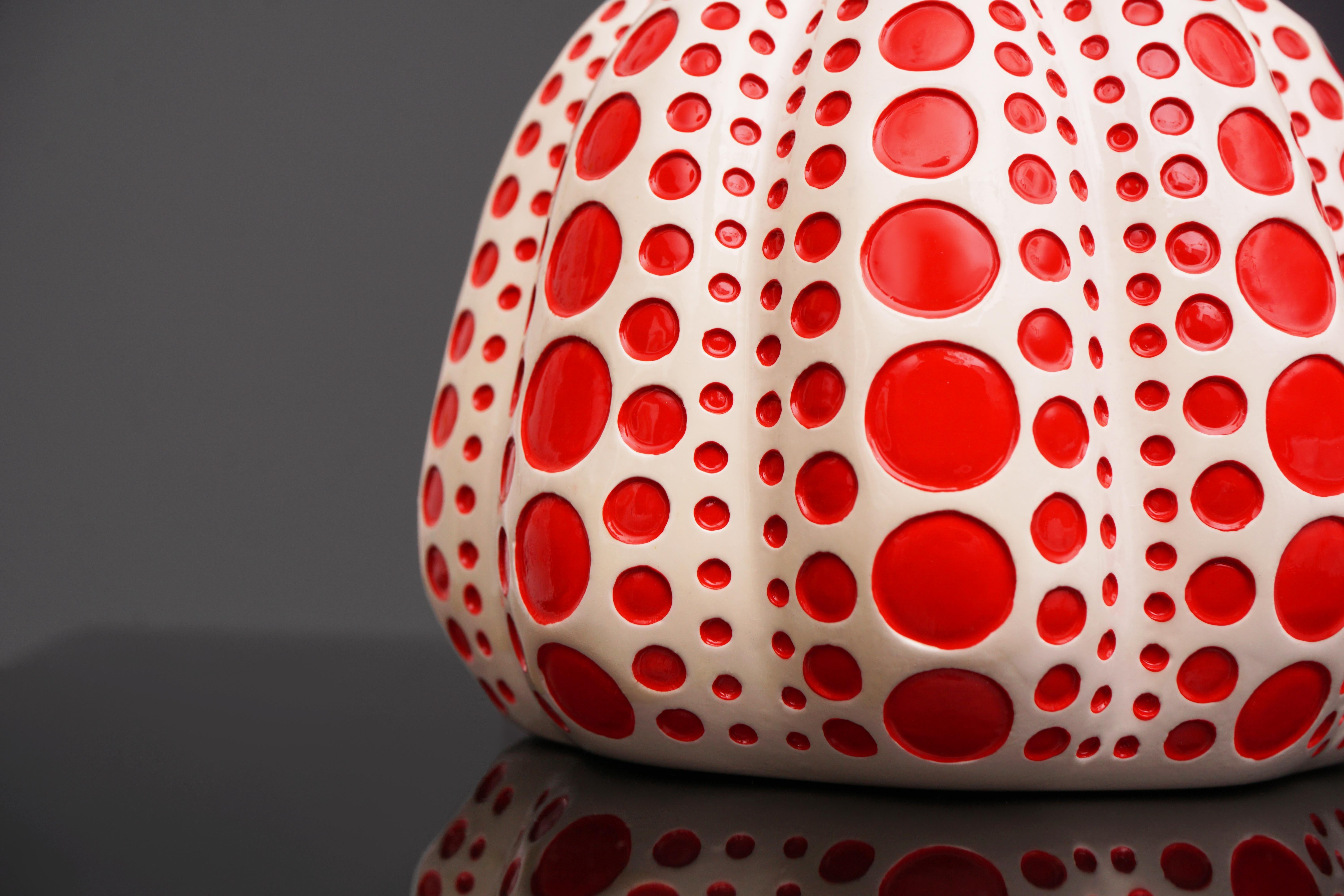 The ’Pumpkin' sculpture is a polka-dotted painted lacquer resin collectible object by the legendary contemporary Artist, Yayoi Kusama. Created in 2016, the polka-dot pumpkin series is a quintessential example of Kusama’s iconic spot-patterned motif,