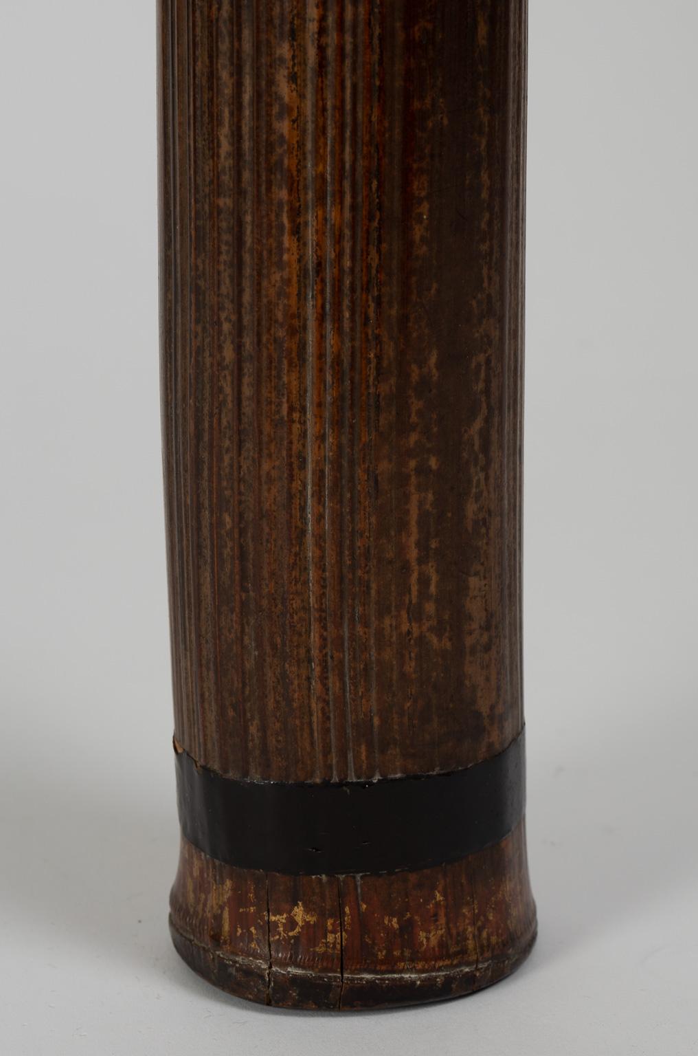 Yazutsu
Kyudo arrow case,

19th century

Lacquered bamboo, 92 x 7 cm

 

The yazutsu is a type of quiver used in kyudo, Japanese archery.
This rare exemplar is obrained from a large bamboo; the cover is lacquered and decorated with a