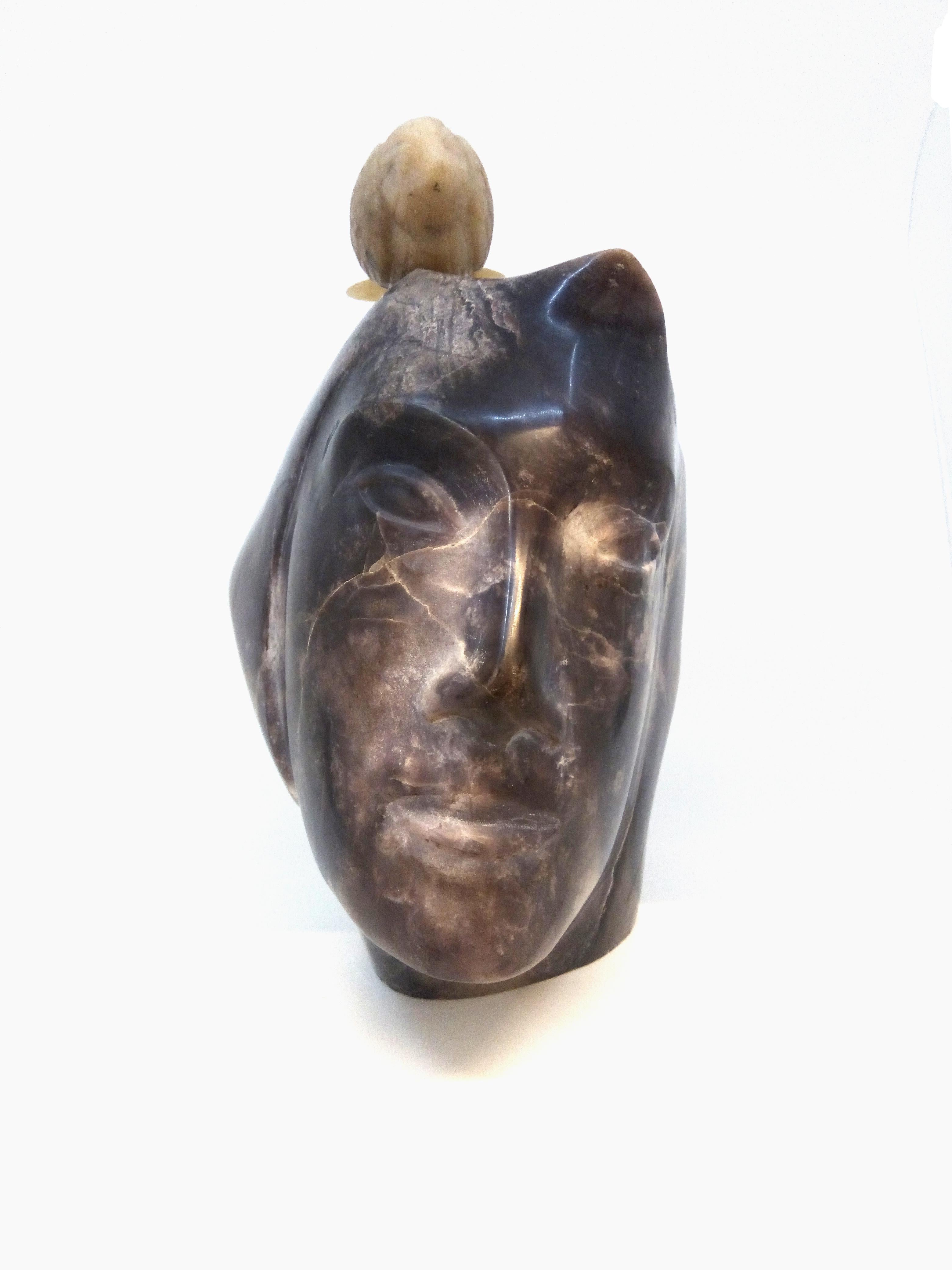 Bird In My Head

Agate and Opal Stone Carving