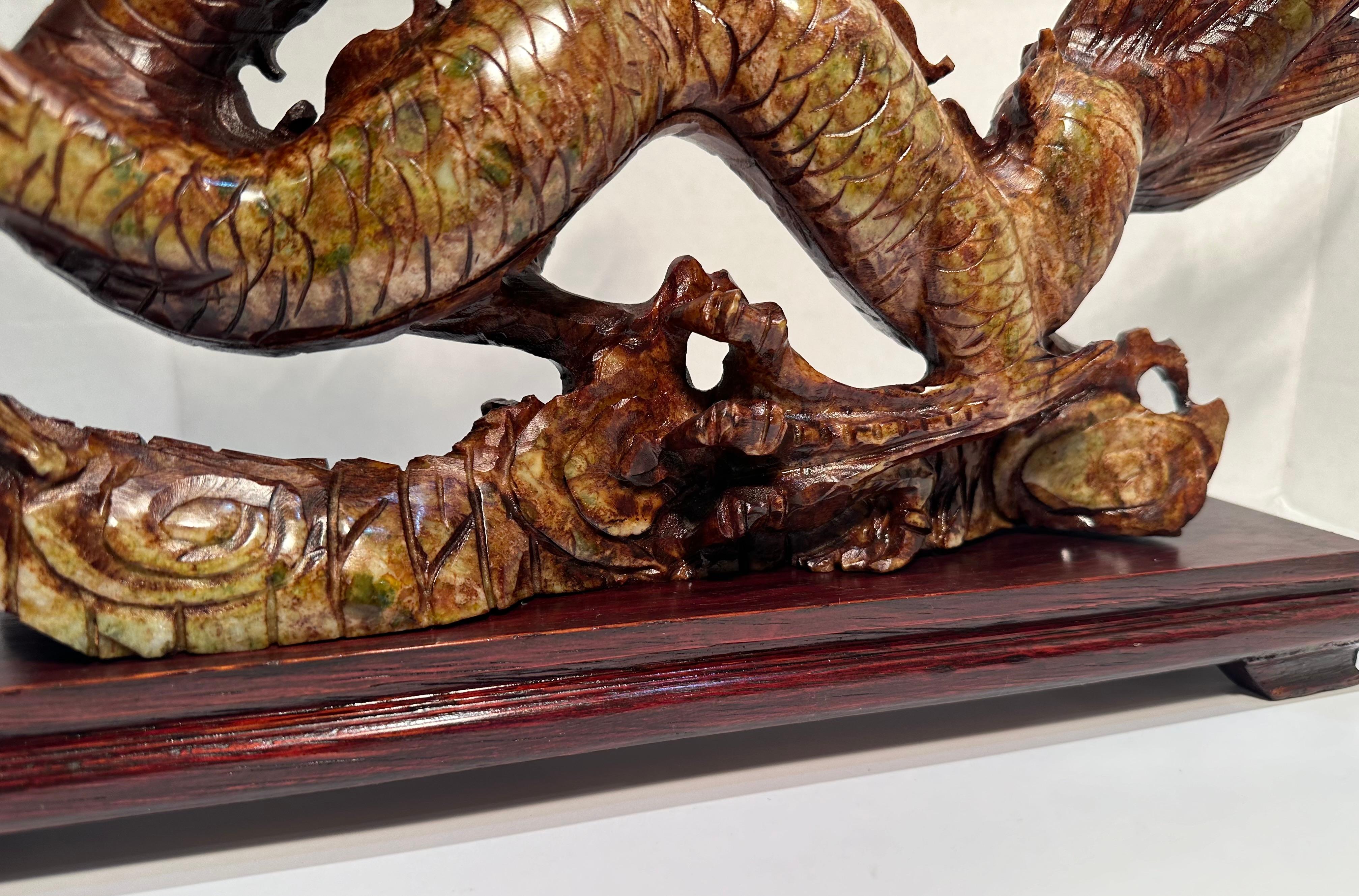 20th Century Year of the Dragon Elaborate Hand Carved Stone Dragon Sculpture on Rosewood Base For Sale