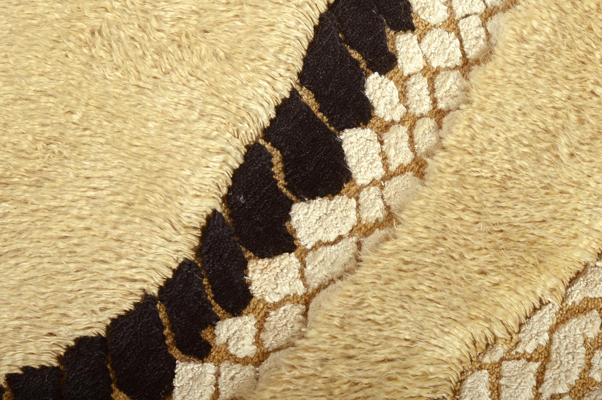 This rug holds personal importance for liesel, paying homage to her mother’s origin in Thailand and the mythology and imagery of a place brought to life in stories. The serpent is an auspicious symbol. Liesel’s serpent is particularly charming. At