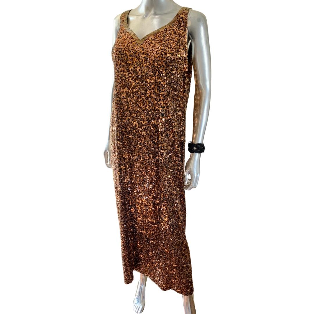 It’s rare to find a hand beaded gown by a leading New York designer in larger size. This gown was specially ordered in size 18. This luxe, timeless gown was never worn. Yearick label by designer Stephen Yearick, carried at Saks Fifth Avenue, NYC.