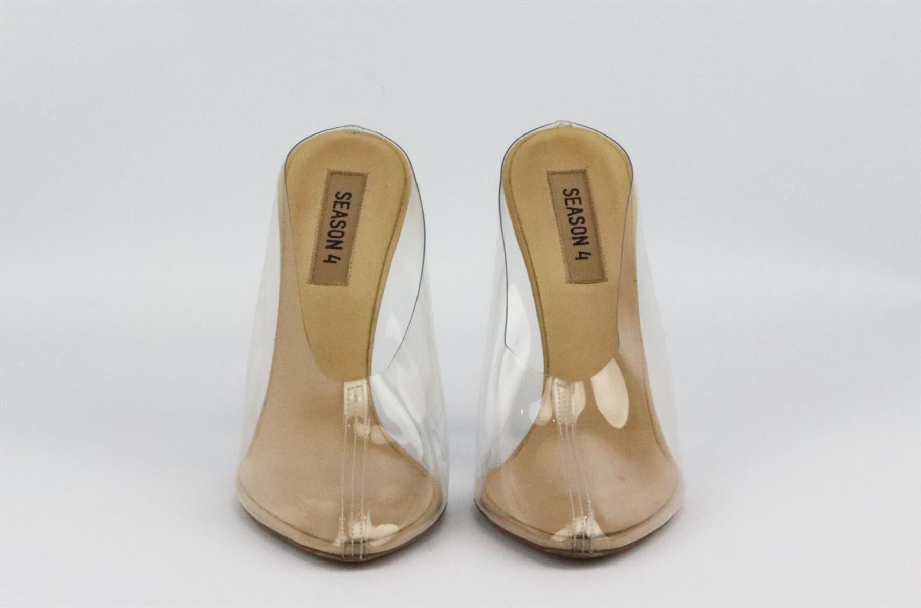 These mules by Yeezy have been handmade in Italy from glossy leather and have sheer PVC case that molds to the shape of your feet, they're designed with sharply pointed toes and set on 101mm curved wedge heels that lengthen your legs. Heel measures