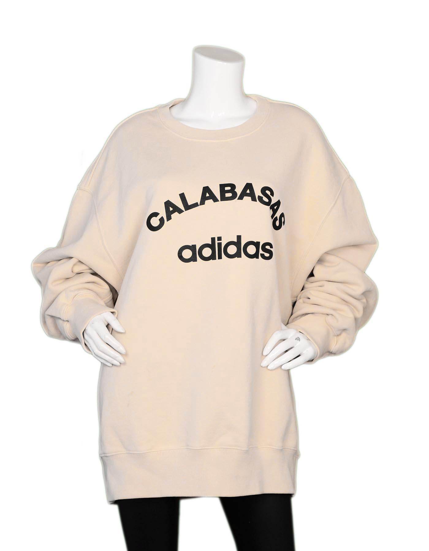 Yeezy Season 5 Beige Calabasas Adidas Crewneck Sweatshirt Men's XL

Color: Beige, black
Materials: 100% cotton
Rib:  95% cotton, 5% elastane
Opening/Closure: Pull over
Overall Condition: Very good pre-owned condition with exception of some light