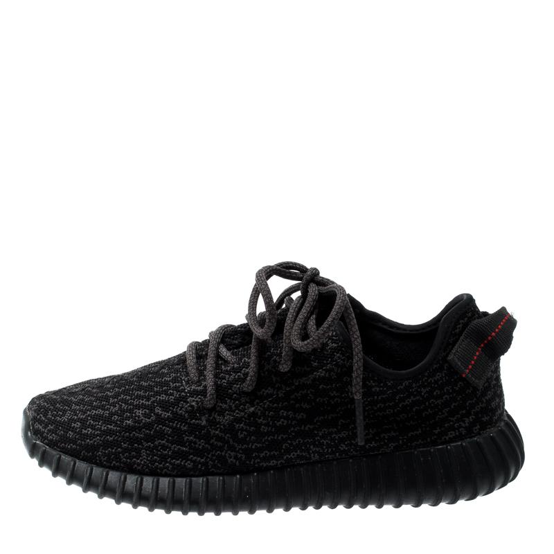 We would love to see you in these Yeezy x Adidas Boost 350 V2 sneakers! The cotton knit pair features great cushioning, lace-ups on the vamps, sock-like fitting, and tubular rubber soles. In this black grey version, the signature 